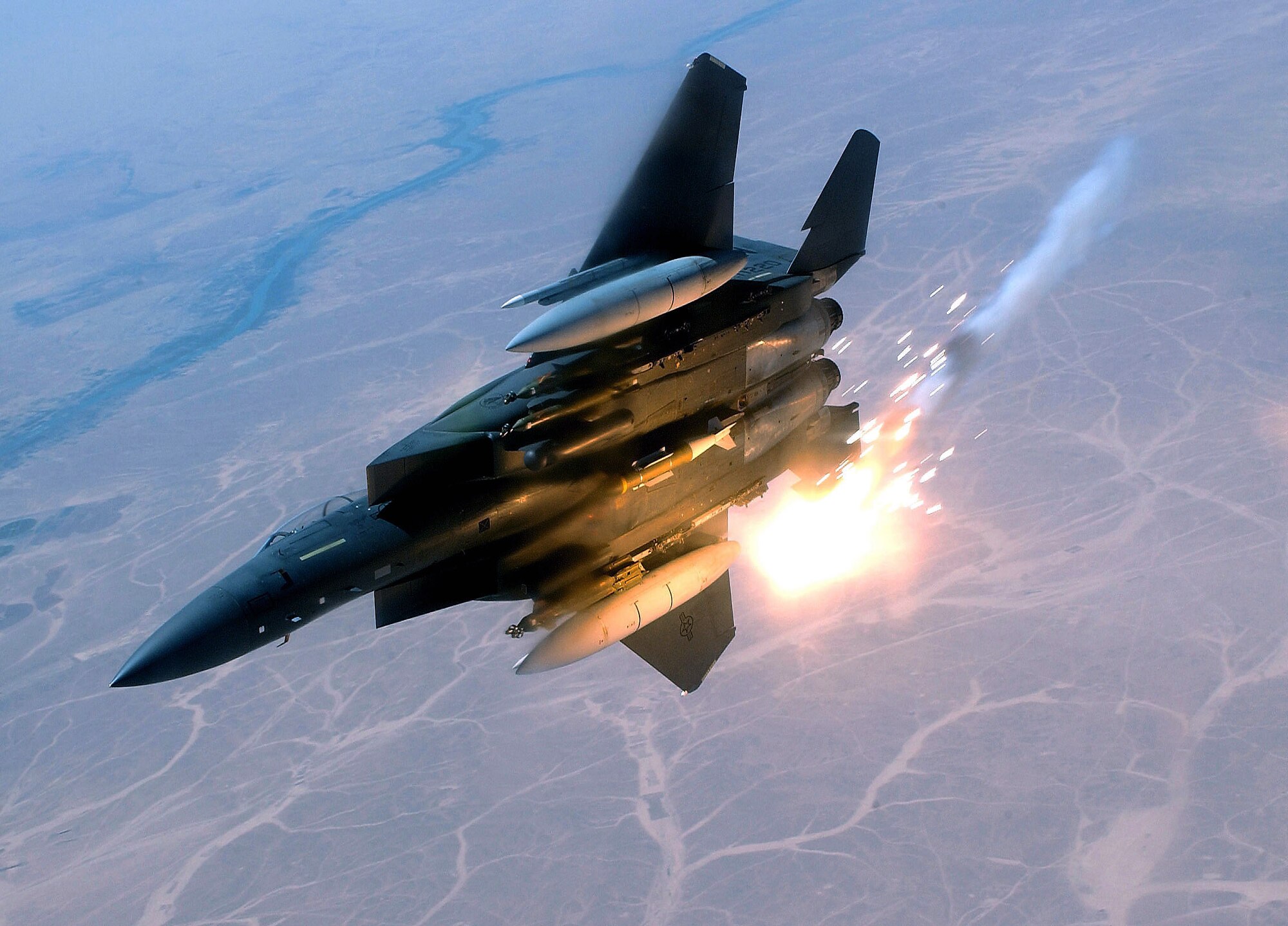 An F-15E Strike Eagle pops flairs during a combat sortie in Southwest Asia. The F-15E's primary role in Afghanistan is providing close-air support for ground troops. (U.S. Air Force photo/Staff Sgt Aaron Allmon II)