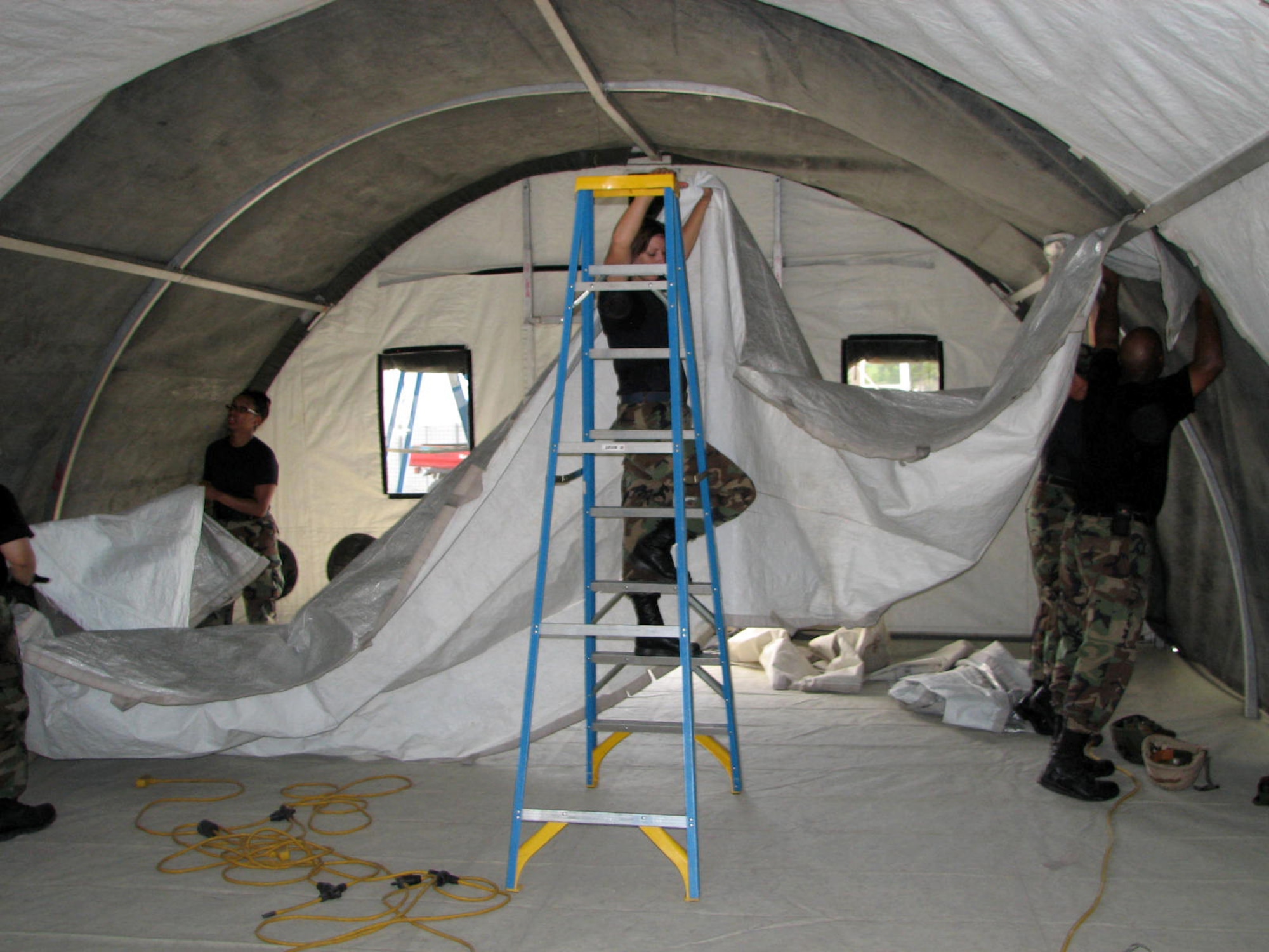 PERSCO students take part in Silver Flag's tent-building exercise at Tyndall Air Force Base, Fla., where more than 140 Silver Flag students set up 10 Alaskan Small Shelters in preparation for a forward deployment exercise later in the week. (U.S. Air Force photo/Master Sgt. Charlie Carr)