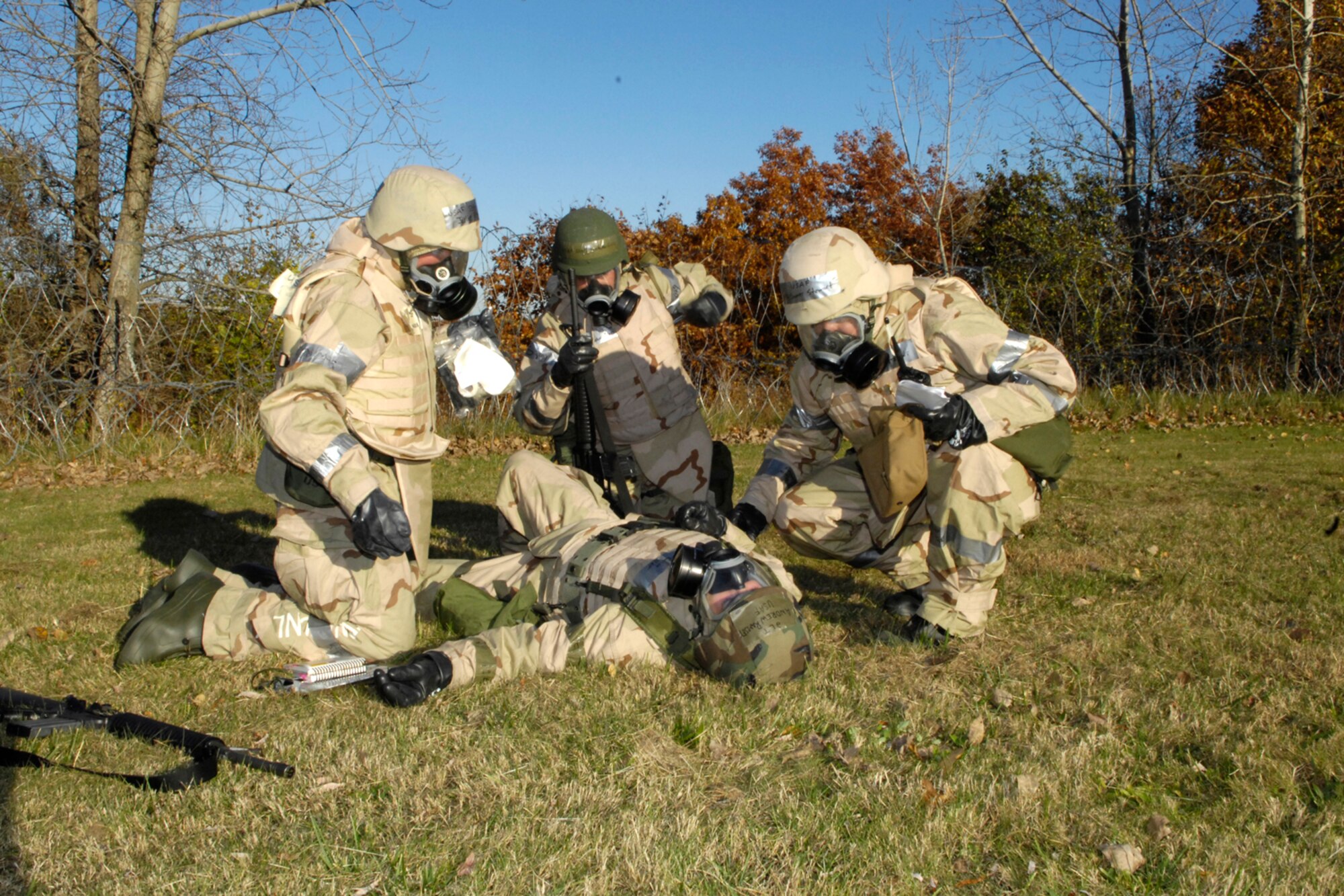HANSCOM AIR FORCE BASE, Mass. – Hanscom Airmen tend to a victim during a Targeted Readiness Inspection scenario at Camp Patriot on Oct. 31. The base is undergoing a Unit Compliance Inspection and Targeted Readiness Inspection through Nov. 10. (U.S. Air Force photo by Walter Santos)