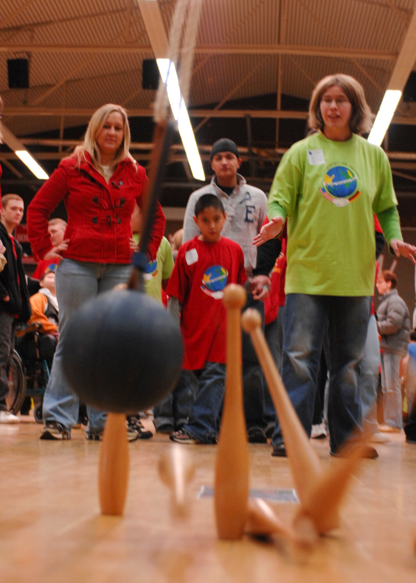 SPANGDAHLEM AIR BASE, Germany -- Sonja Schmitz, a student at St. Martin’s School, knocks down pins at the rope bowling event during St. Martin's Children's Day, Oct. 30, 2008. (U.S. Air Force photo by Airman 1st Class Nathanael Callon)