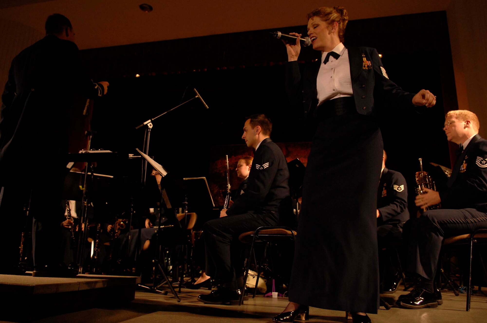 U.S. Air Force Tech. Sgt. Amy Lukens-Malone, U.S. Air Forces in Europe Concert Band vocalist, sings "A Spoon Full of Sugar" at the Nae Leonard Musical Theater, Galati, Romania, Nov. 1, 2008. The USAFE Concert Band brings the sound of America to Europe's finest concert halls and theaters. (U.S. Air Force by Senior Airman Amber Bressler)