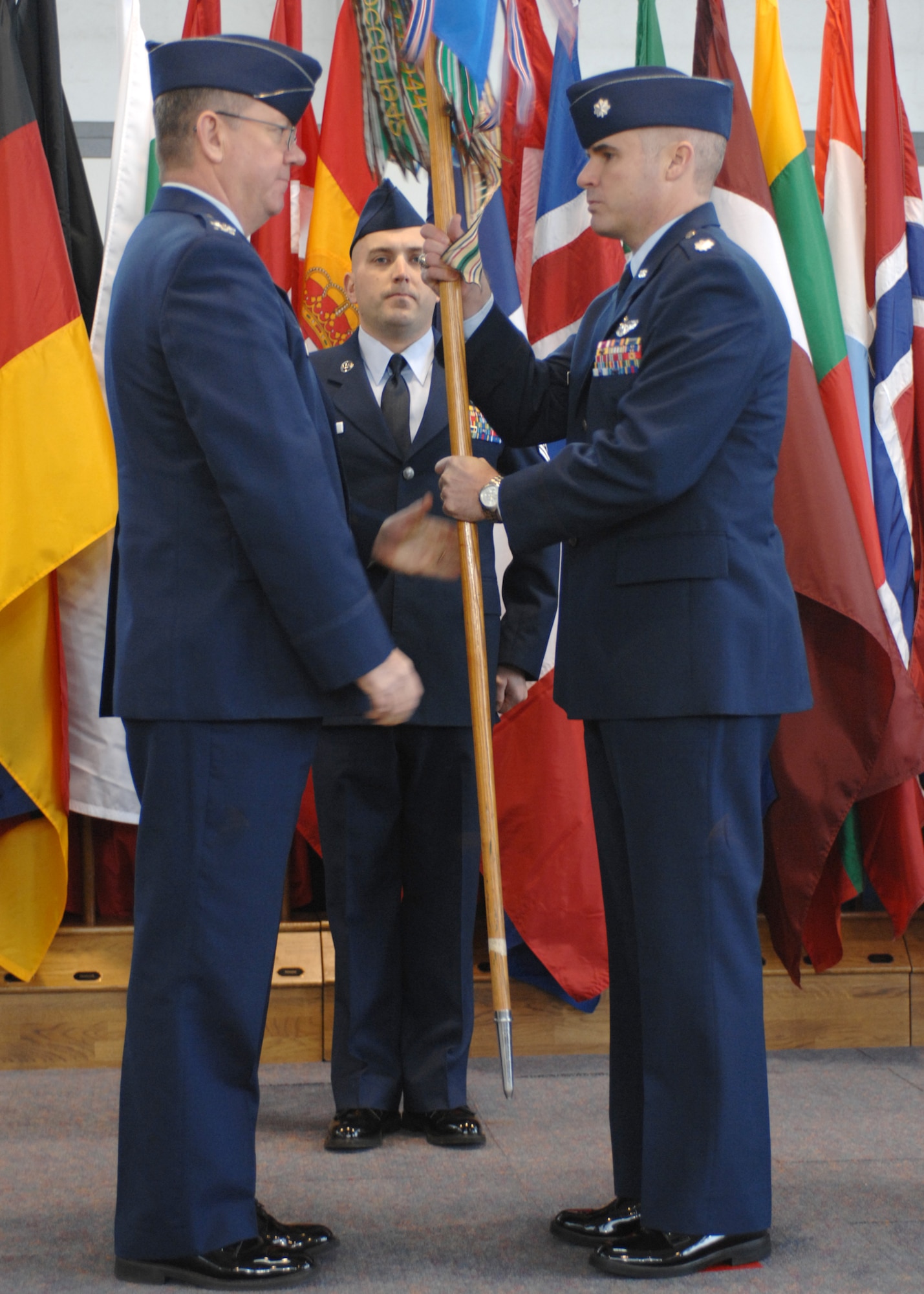 SPANGDAHLEM AIR BASE, Germany -- Col. Patrick McCrea, 52nd Operations Group commander, gives the 23rd Fighter Squadron guidon to Lt. Col. Mike Lay, 23rd FS commander, at the 23rd FS change of command ceremony on Oct. 30, 2008. (U.S. Air Force photo by Airman 1st Class Nathanael Callon)

