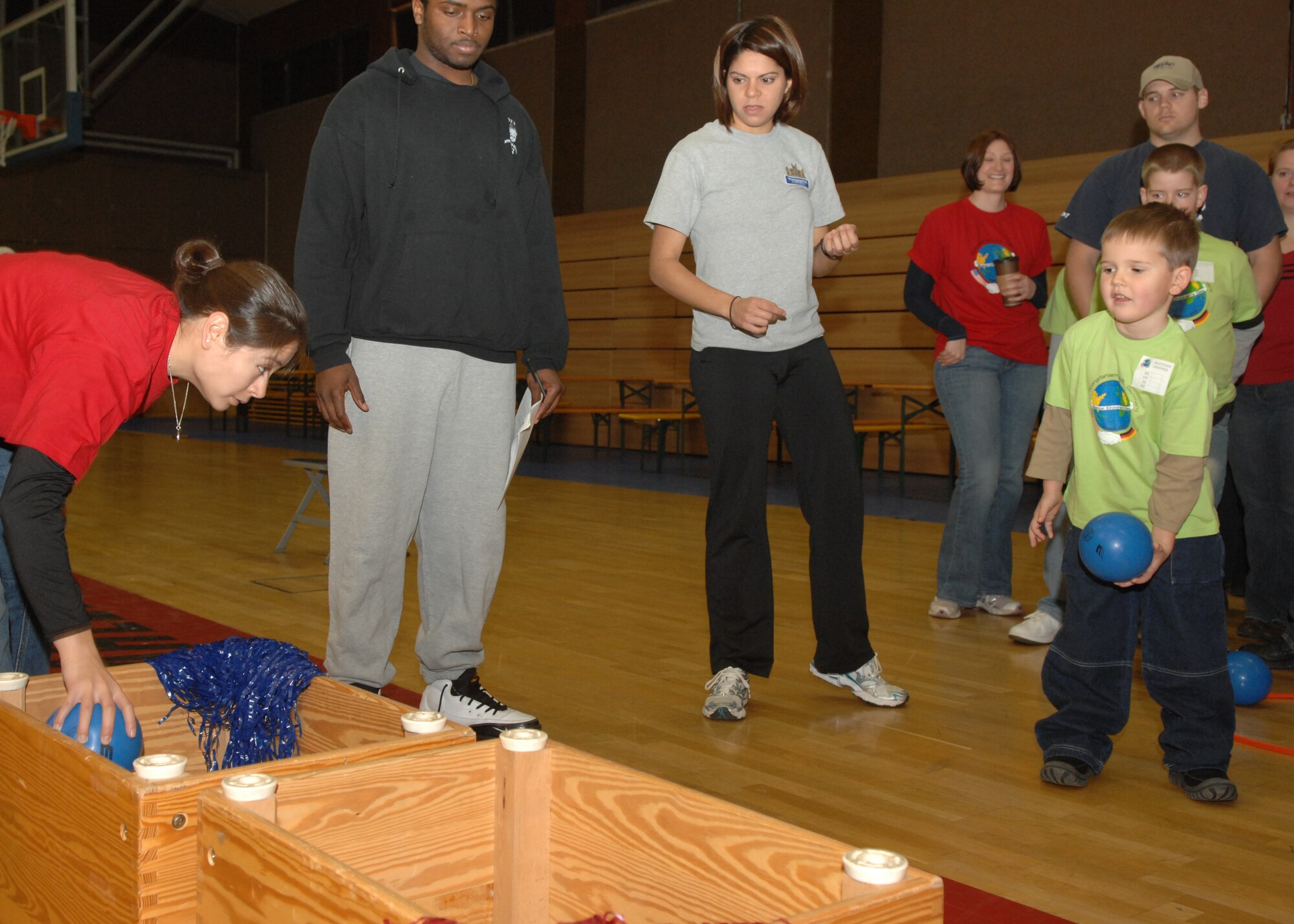 SPANGDAHLEM AIR BASE, Germany –- Christopher Maetteson takes part in ball-toss, one of the several games held at St. Martin’s Children’s day, Oct. 30, 2008.  This was the 13th year Spangdahlem Air Base has hosted this event. (U.S. Air Force photo by Airman Staci Miller)