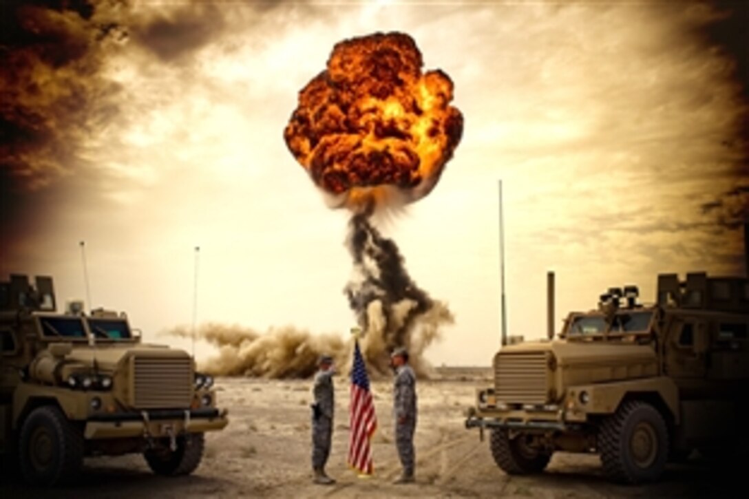 U.S. Air Force Capt. Joshua Tyler, left, re-enlists Staff Sgt. Andrew Petrulis, Explosive Ordnance Division craftsman, at Kandahar Air Field, Afghanistan, Oct. 27, 2008. Petrulis' teammates took advantage of a training opportunity to time the "fireball" detonation at a safe distance to make the reenlistment a more memorable event for their comrade. Tyler and Petrulis are assigned to the 755th Air Expeditionary Group Explosive Ordinance Disposal Operating Location. 
