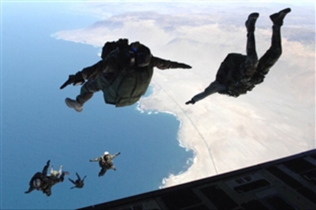 U.S. and Chilean pararescue airmen jump from the back of a C-17 Globemaster III near Iquiqui, Chile as part of Operation Southern Partner, Oct. 29, 2008. Operation Southern Partner is an in-depth, two-week subject matter exchange emphasizing partnership, cooperation and sharing of information with partner nation's air forces in Latin America.