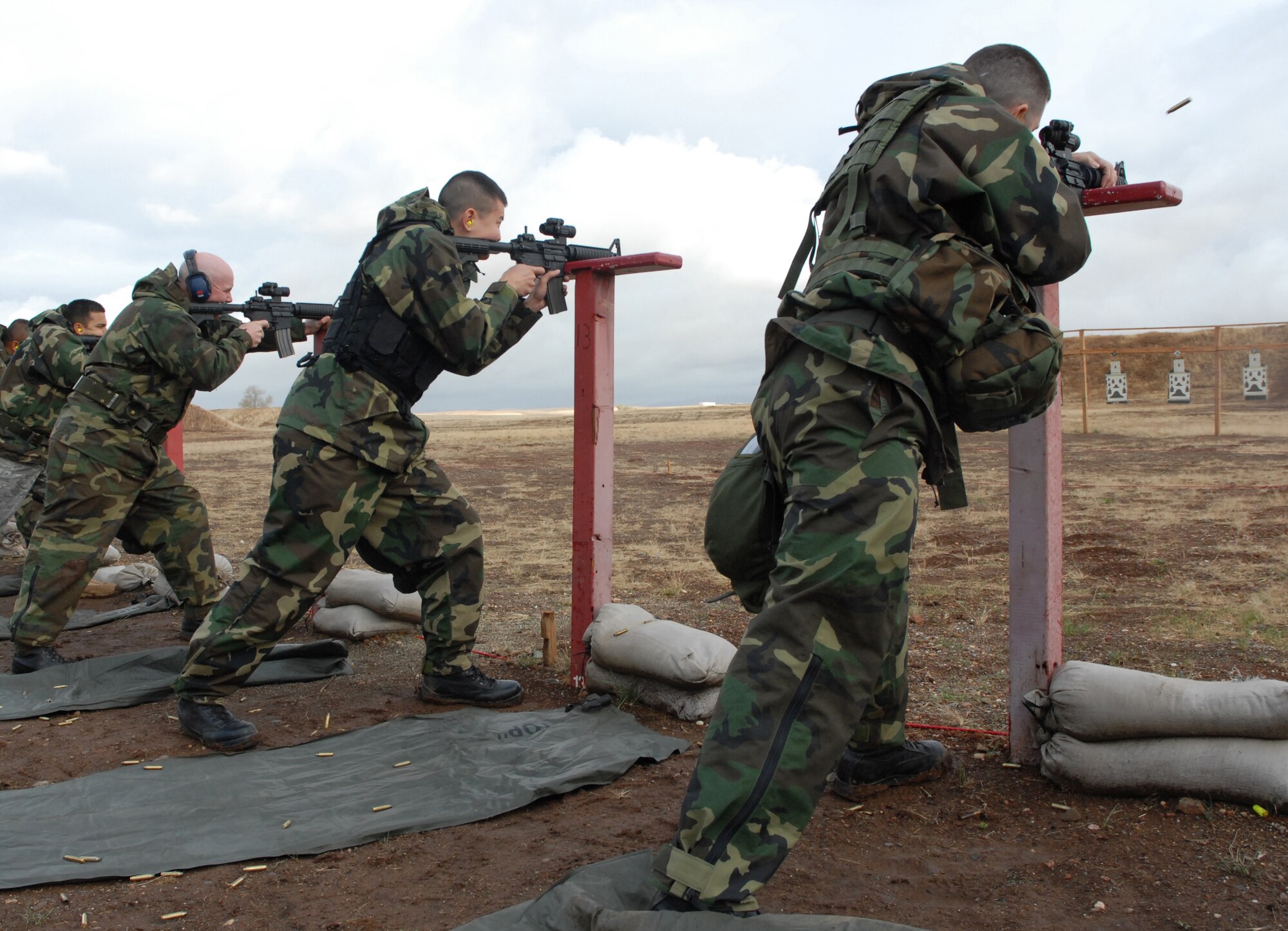 BEALE AIR FORCE BASE, Calif. -- Citizen Warriors from the 940th Air Refueling Wing's Security Forces Squadron fire rounds during a M-4 qualification weapons shoot at the November unit training assembly weekend here. Air Force Reservists are required to maintain the same level of combat readiness as their active duty counterparts. (U.S. Force Photo/ Tech. Sgt. Luke Johnson)