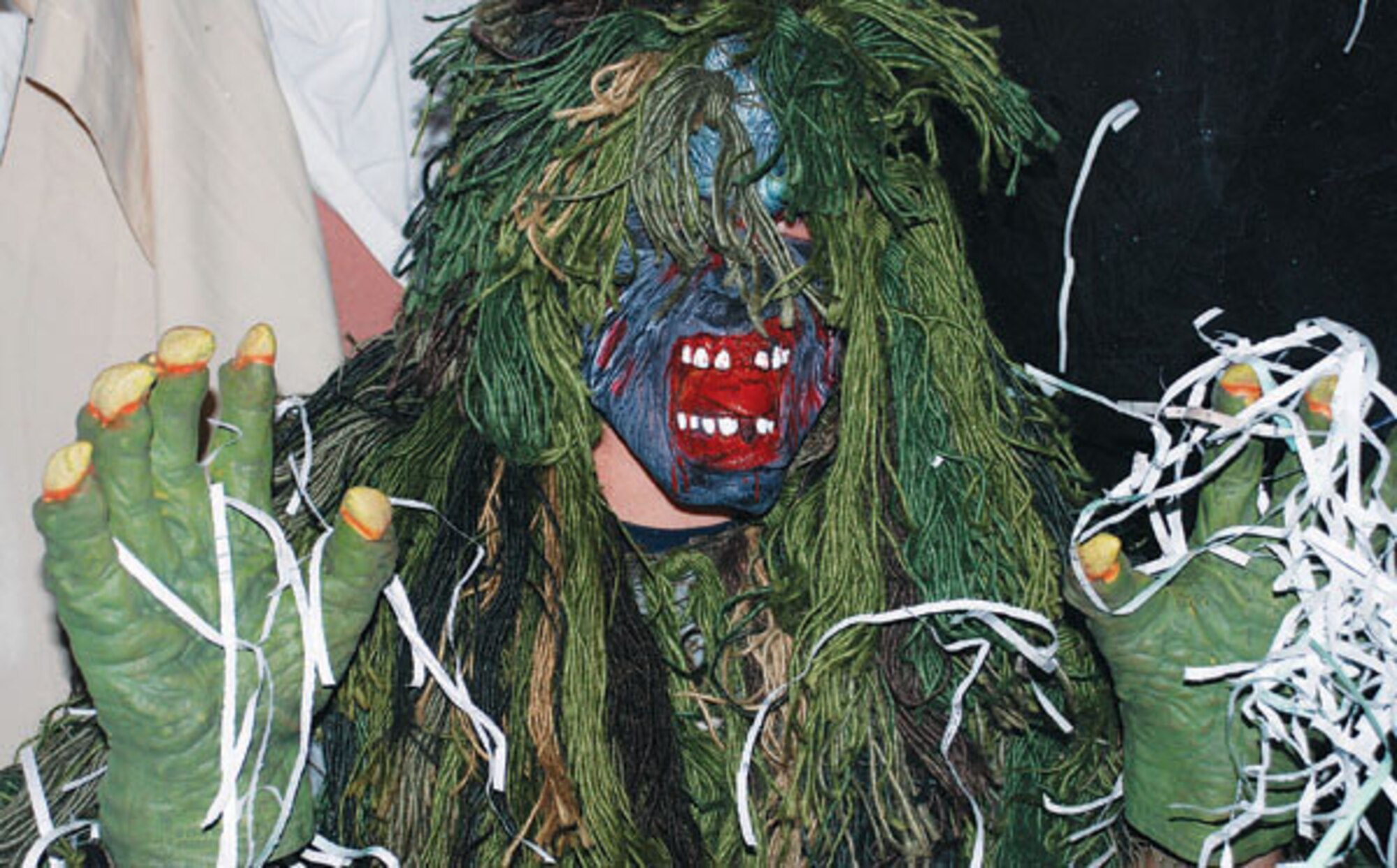 Airman 1st Class Jason Demo, 90th Missile Maintenance Squadron, tries to scare viewers of the base haunted house Oct. 24 in Bldg. 1200. The haunted house is open tonight from 7 to 10 p.m. There is also a children's haunted house open at the same time. (Photos by 2nd Lt. Brooke Brzozowske)