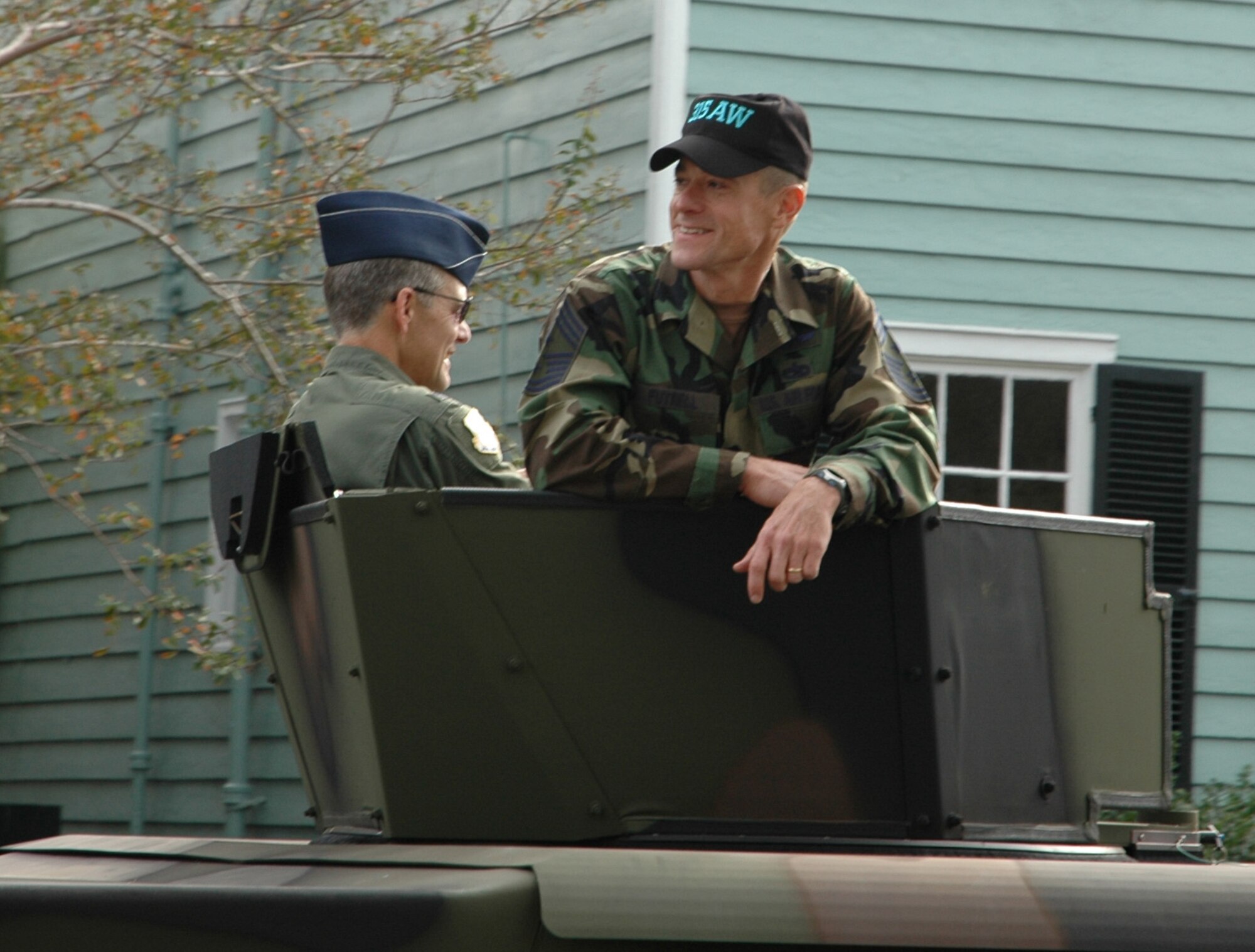 315th Airlift Wing Command Chief Master Sergeant Benson S. Futrell greets the crowd during a veteran appreciation parade in Charleston, S.C. (U.S. Air Force photo/Tech. Sgt. Jeff Kelly)  