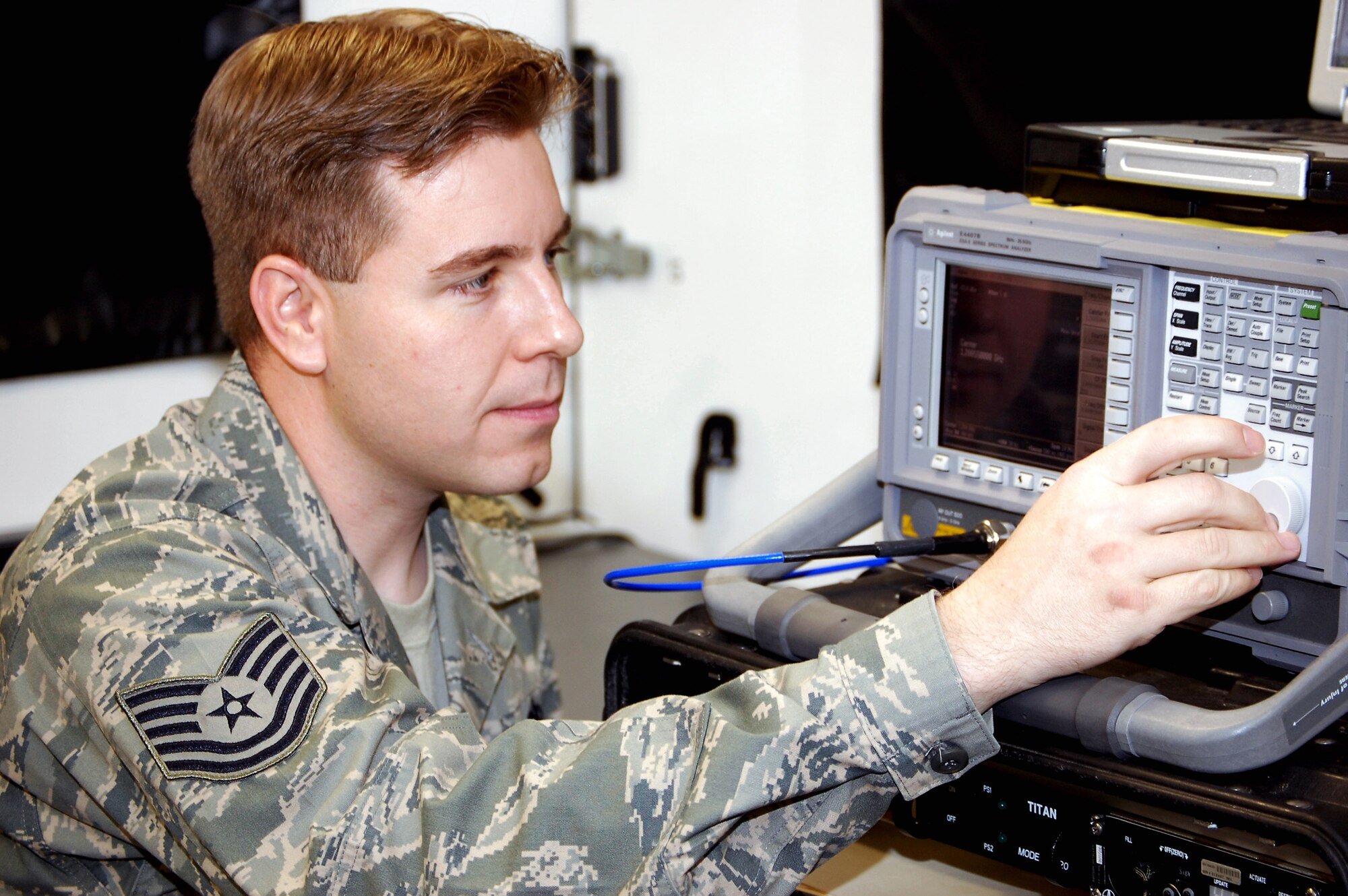 Tech. Sgt. Adrian McDonough prepares equipment in a Small Package Initial Communications Element package for use in the Mobility Operations School's mobile command, control and communications training facility on the expeditionary center campus Oct. 29 at Fort Dix, N.J. The SPICE Course is a new course in the MOS starting in February 2009. Sergeant McDonough is the course director for the U.S. Air Force Expeditionary Center's SPICE Course. (U.S. Air Force Photo/Tech. Sgt. Scott T. Sturkol)