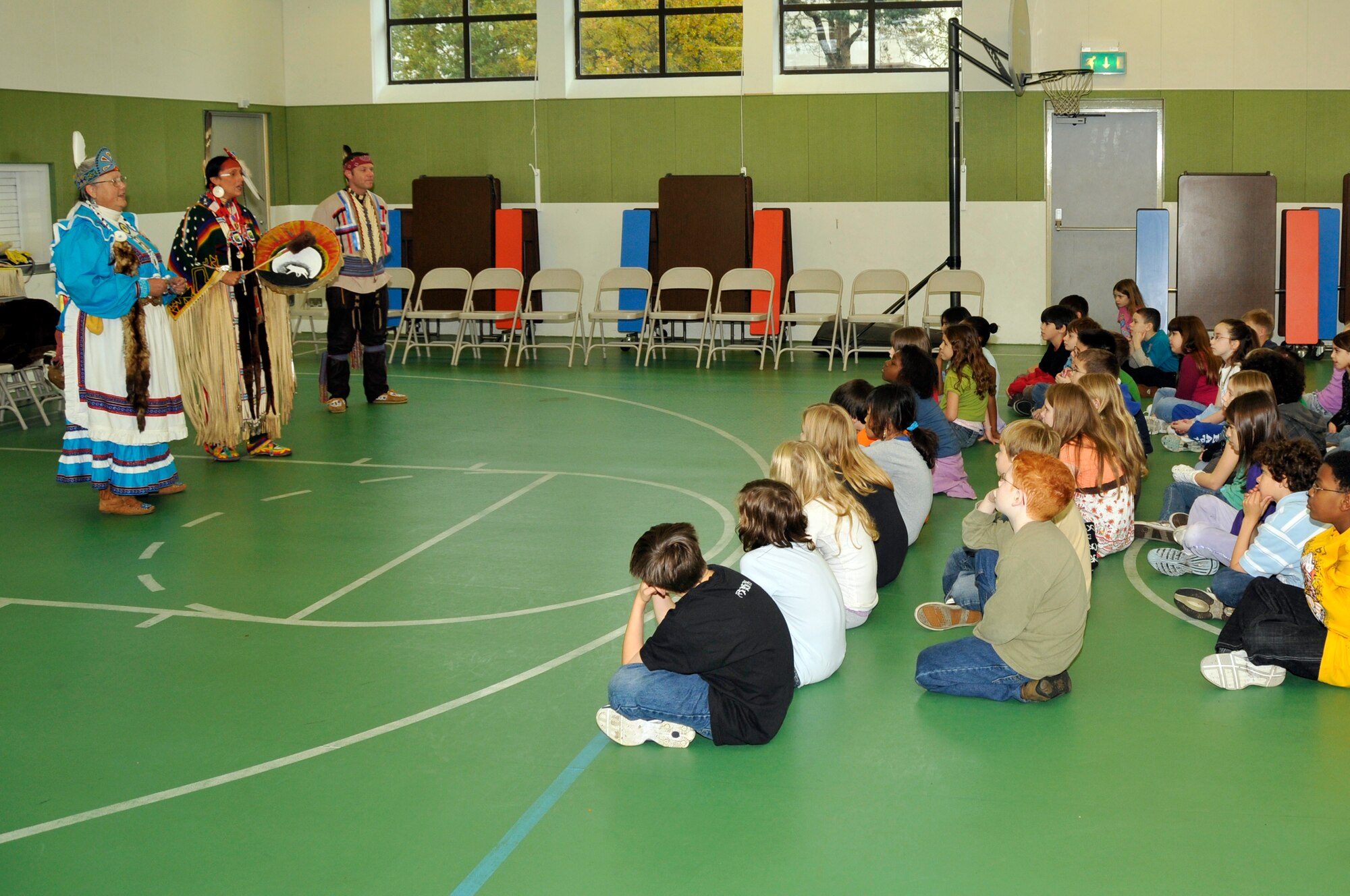 Ohoyu Anoli Hekia a Choctaw Indian and Shunkaha Wanagawin of the Lakota Nation, sing a tribute song to the Cherokees Nov. 4 at RAF Lakenheath, England. Native Americans visited the Liberty Intermediate school to teach students about Native American Culture (U.S. Air Force photo by Airman 1st Class Perry Aston) 