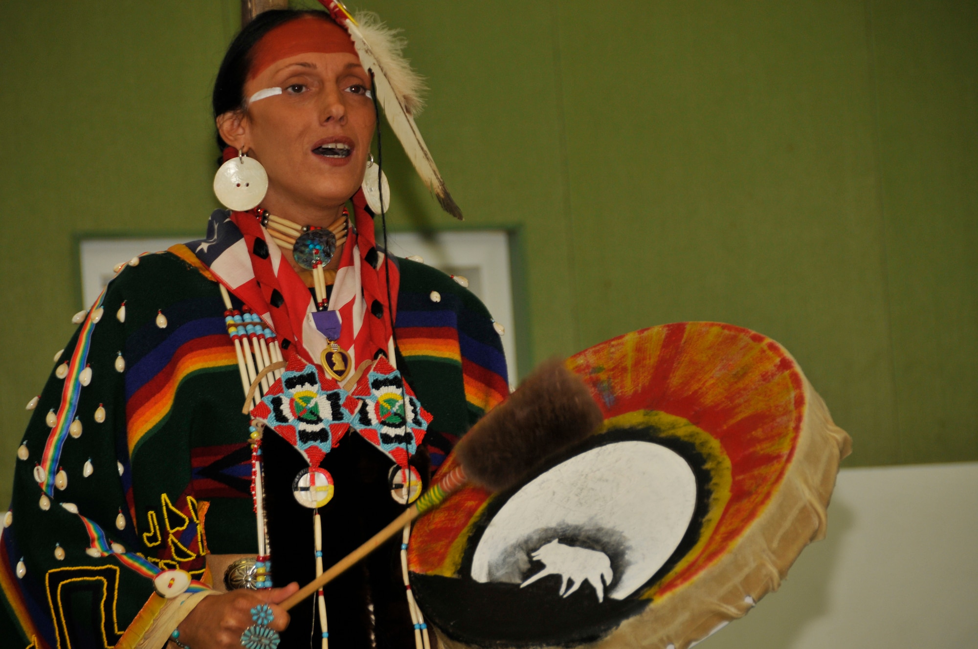 Shunkaha Wanagawin of the Lakota Nation, sings a tribute song to the Cherokees Nov. 4 at Liberty Intermediate School. Native Americans visited RAF Lakenheath to teach students about Native American Culture. (U.S. Air Force photo by Airman 1st Class Perry Aston)