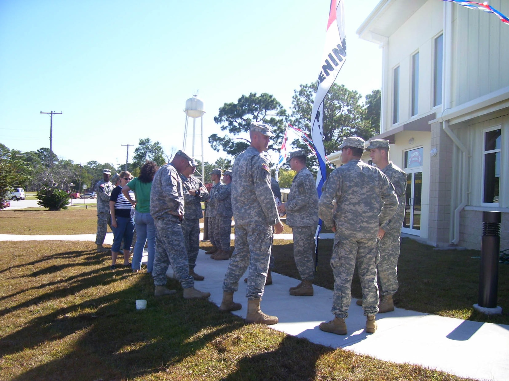 EGLIN AIR FORCE BASE, Fla. -- Patrons assigned to the 6th Ranger Battalion wait for the new AAFES shoppette to open Nov. 3. On October 4, 2005, the Gator Lounge and AAFES Shoppette caught fire and burned to the ground.  In the years following the fire, the Rangers and families stationed at Camp Rudder originally made do with a Tactical Field Exchange Unit, a mobile tractor-trailer assembly usually used downrange, before moving to a temporary building in October 2007.  The rebuilt facility contains the Gator Lounge, a concession barber shop and the AAFES Shoppette. (AAFES photo/Daniel Eddington)