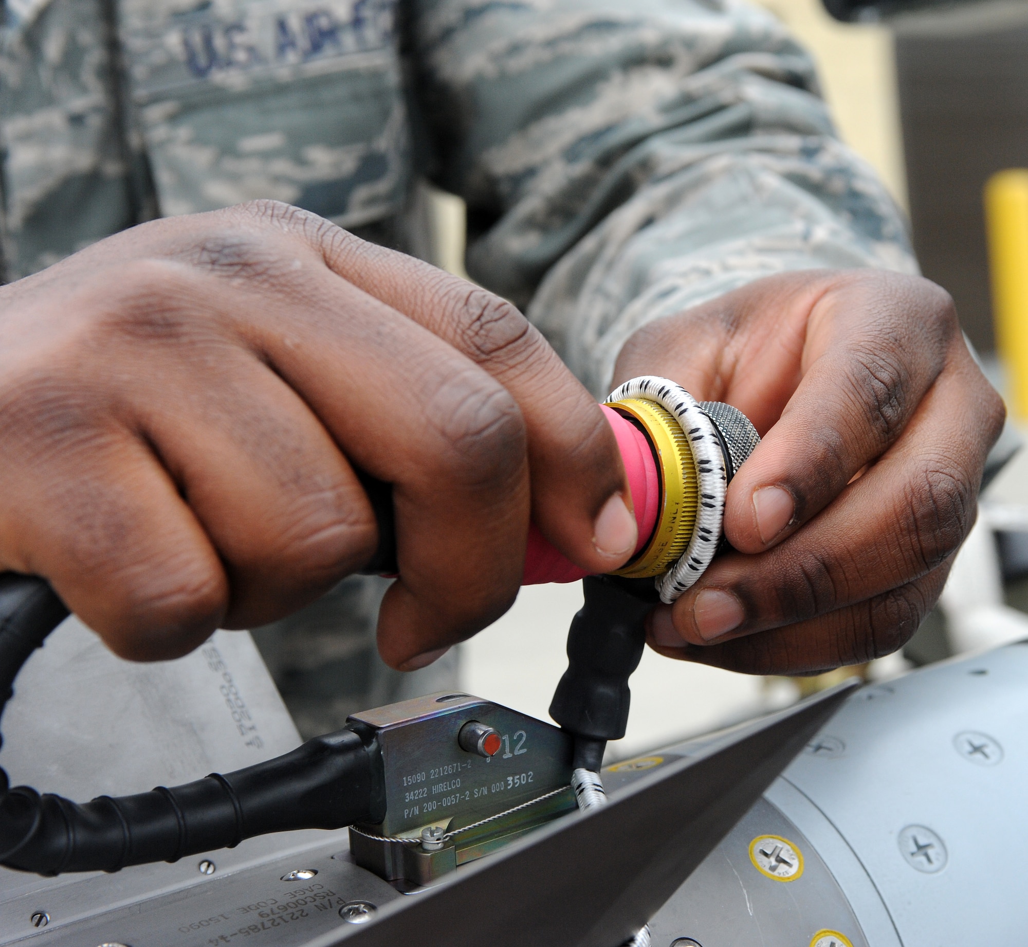 LANGLEY AIR FORCE BASE, Va. – Staff Sgt. Taylor Douglas, 1st Equipment Maintenance Squadron precision guided munitions crew chief, performs a post load inspection on a missile Oct. 17. The munitions flight provides the things that go boom. The flight can support any aircraft with missiles, bombs, small arms ammunition, and counter measures, including aircraft supporting Operation Noble Eagle.  (U.S. Air Force Photo/Airman 1st Class Zachary Wolf)