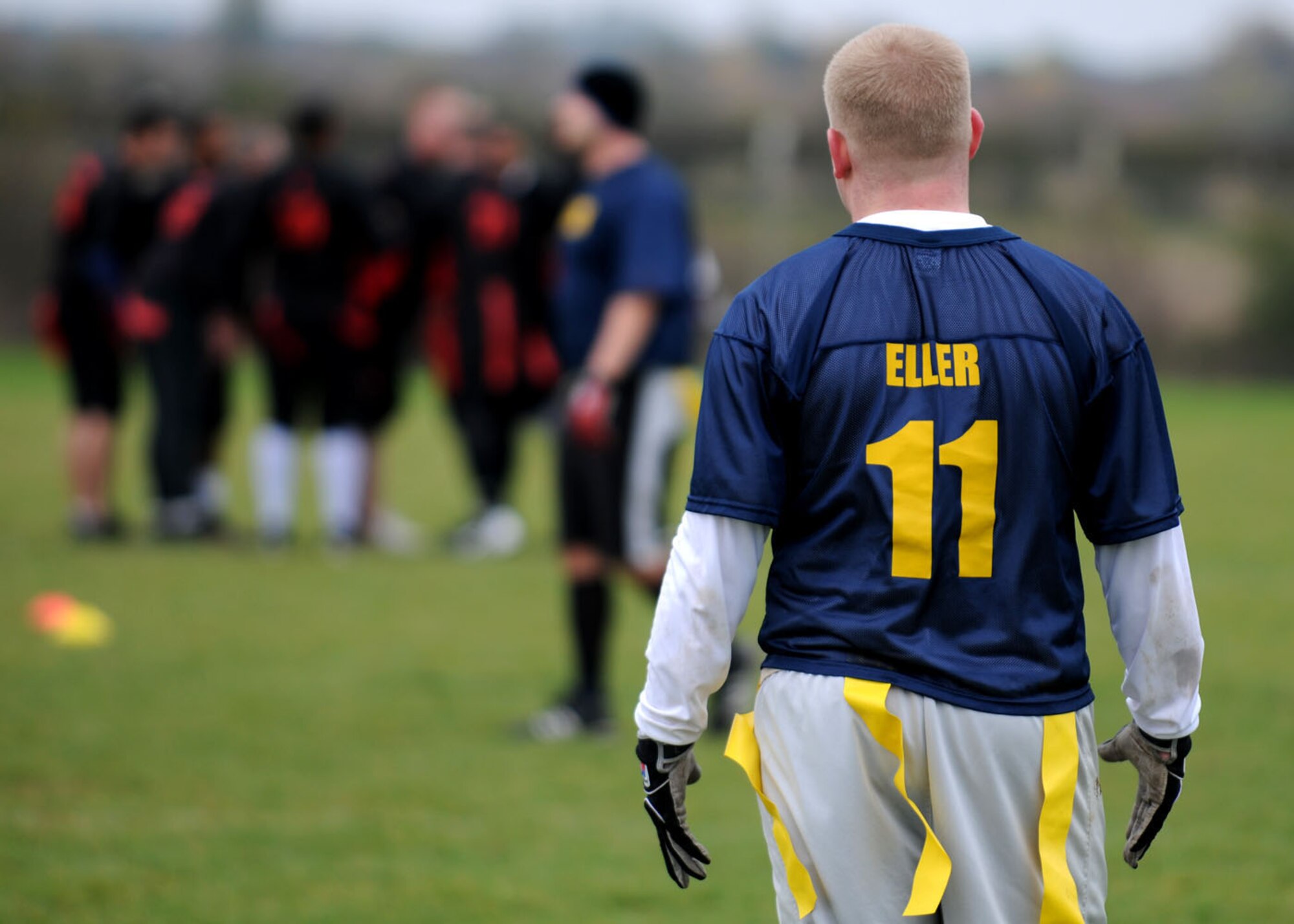 Erik Eller, from the 100th Communications Squadron readies himself at the safety position for the next play during the flag football championship game Nov. 1, 2008, at RAF Mildenhall, England. The communications squadron defeated the logistics readiness squadron with a 1-point victory with the final score of 14-13. (U.S. Air Force photo by Staff Sgt. Jerry Fleshman)