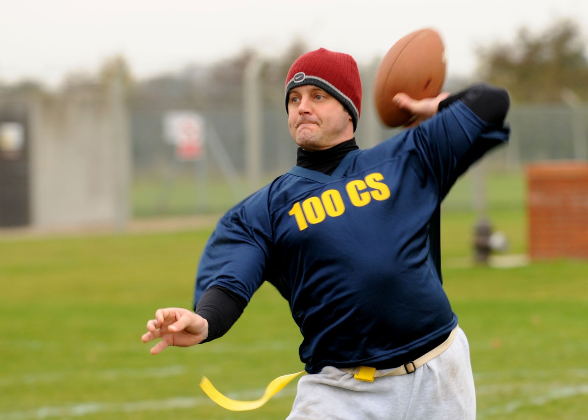 Greg Sartain from the 100th Communications Squadron looks down field to deliver the deep ball to a open receiver during the flag football championship game Nov. 1, 2008, RAF Mildenhall, England. The communications squadron defeated the logistics readiness squadron with a 1-point victory with the final score of 14-13. (U.S. Air Force photo by Staff Sgt. Jerry Fleshman)