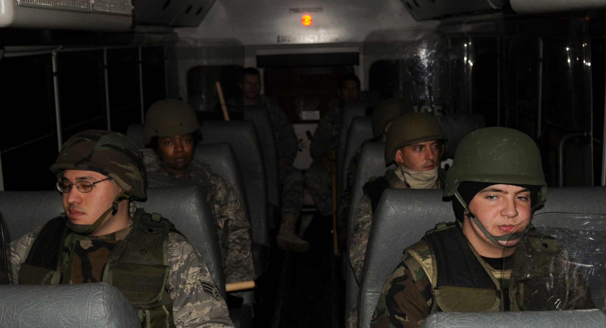 Security Forces Airmen wait Nov. 3, 2008, at  Eielson Air Force Base, Alaska. Security Forces are prepared to guard the gate in case the protesters become violent during the operational readiness exercise. (U.S. Air Force photo/Airman Laura Max) (Released)