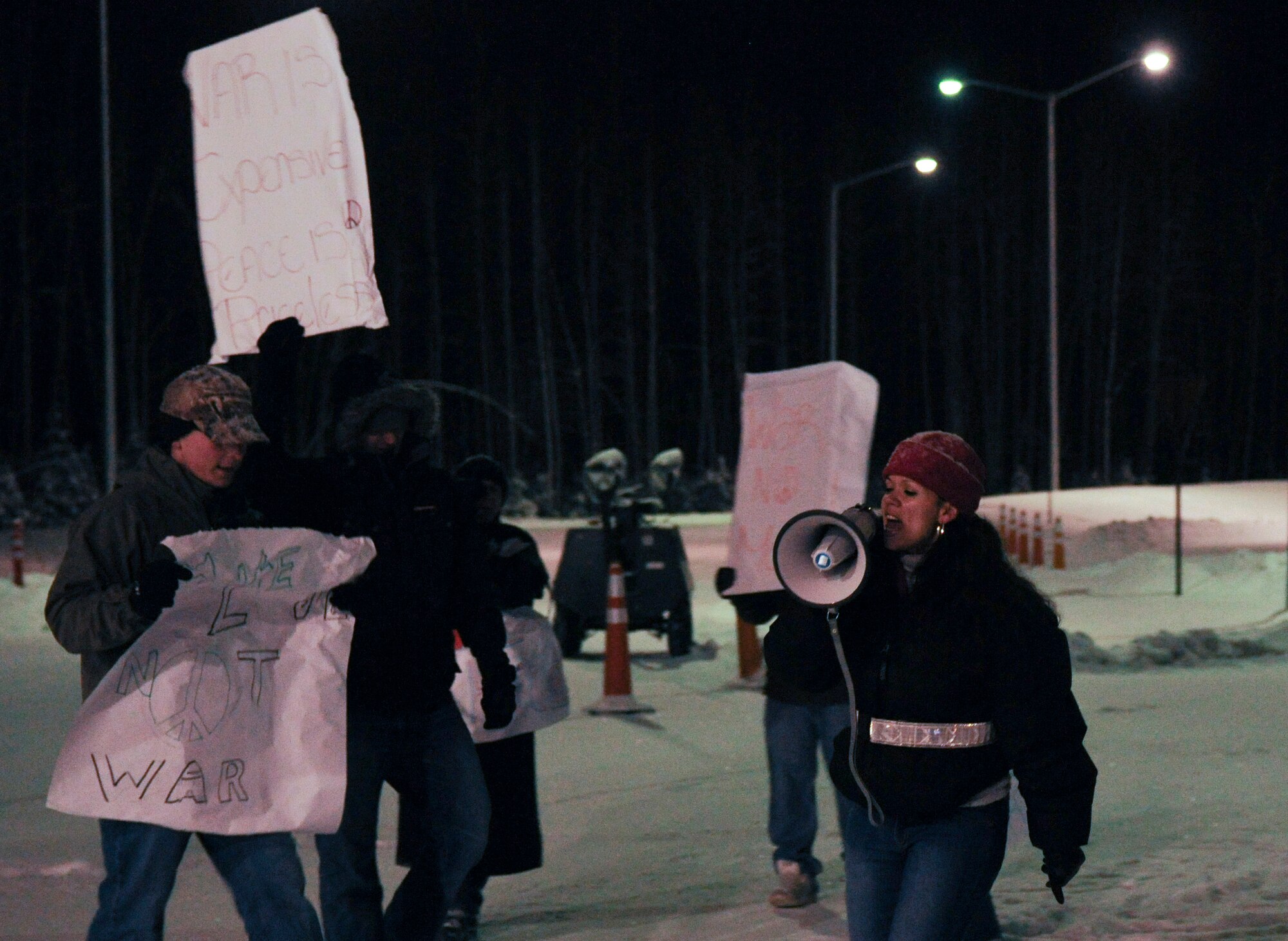 Protesters gather outside Hursey Gate Nov. 3, 2008, at Eielson Air Force Base, Alaska. The protesters were practicing their First Amendment, Freedom of Speech rights, (during an operational readiness exercise) which the United States of America Armed Forces fights to protect. (U.S. Air Force photo/Airman Laura Max) (Released)
