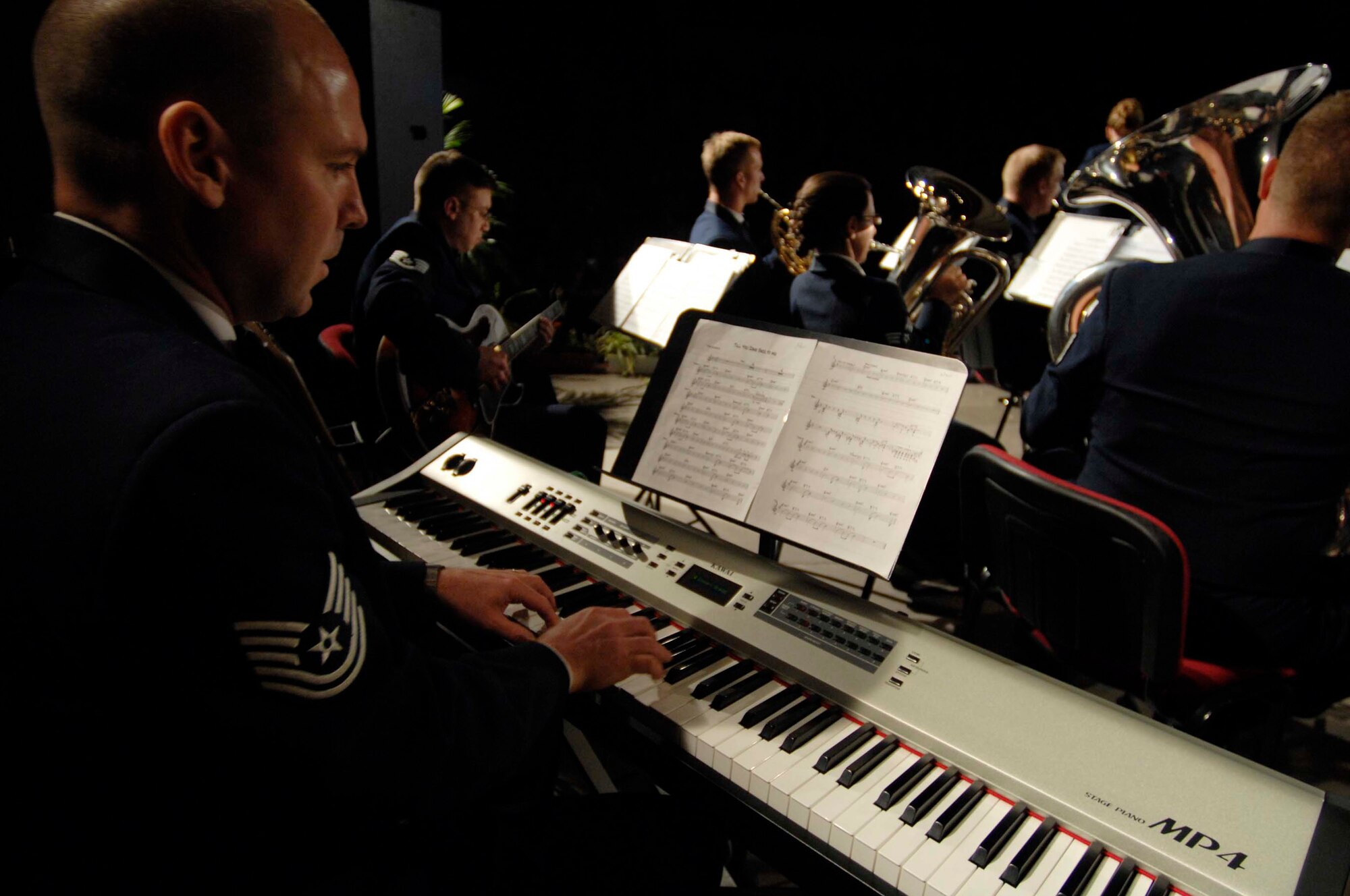 U.S. Air Force Tech. Sgt. Vincent  Dublino, U.S. Air Forces in Europe Concert Band pianist, performs during a concert at the Maria Filotti Theater, Braila, Romania, Nov. 2, 2008. The USAFE Concert Band brings the sound of America to Europe's finest concert halls and theaters. (U.S. Air Force by Senior Airman Amber Bressler)(Released)