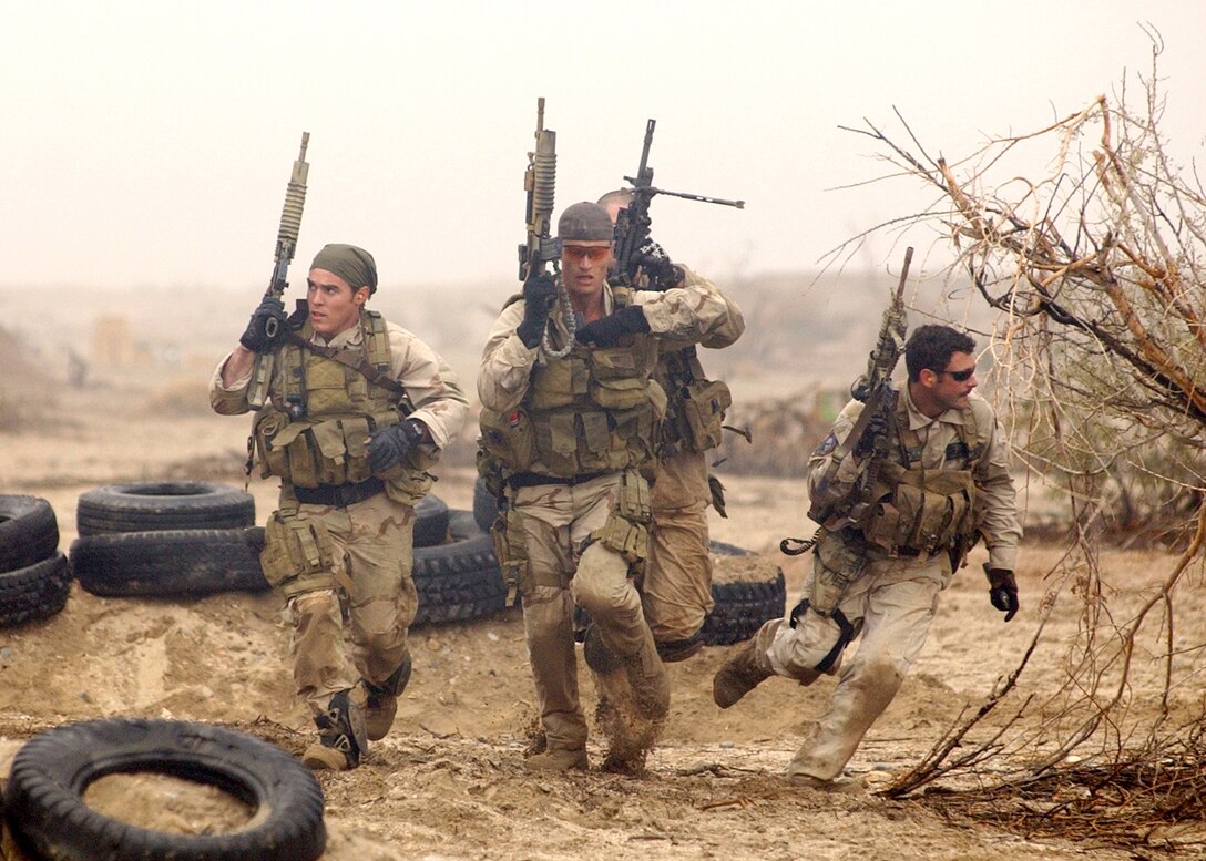 SEAL team members practice desert training exercises in preparation for real world scenarios. SEALs have the ability to conduct a variety of high-risk missions -- unconventional warfare, direct action, special reconnaissance, combat search and rescue, diversionary attacks and precision strikes -- all in a clandestine fashion. U.S. Navy photo by Petty Officer 2nd Class Eric S. Logsdon