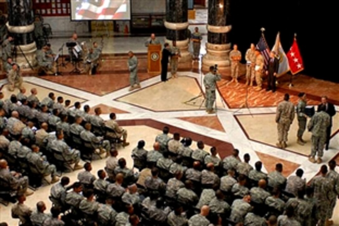 One-hundred eighty-six U.S. servicemembers from across Iraq became American citizens during a naturalization ceremony at Al Faw Palace on Camp Victory, Iraq, Nov. 4, 2008.