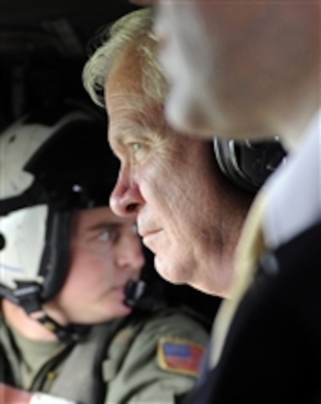 Secretary of Defense Robert M. Gates flies in an HH-60H Seahawk helicopter following his tour of the ballistic missile submarine USS Rhode Island (SSBN 740) at Naval Submarine Base King's Bay, Ga., on Oct. 31, 2008.  