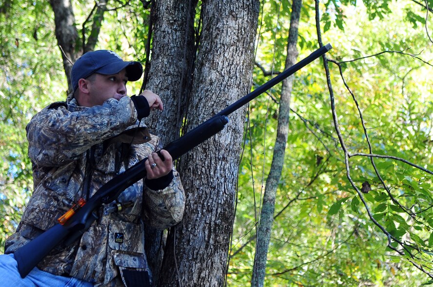 BARKSDALE AIR FORCE BASE, La. - Staff Sgt. Chris Breland, game warden NCOIC, uses a duck call while hunting on the East Side of Barksdale. Hunters are reminded to follow safety measures at all times while hunting. The next hunter’s safety class will be held at 6 p.m. Nov. 20 at the Natural Resources Office.