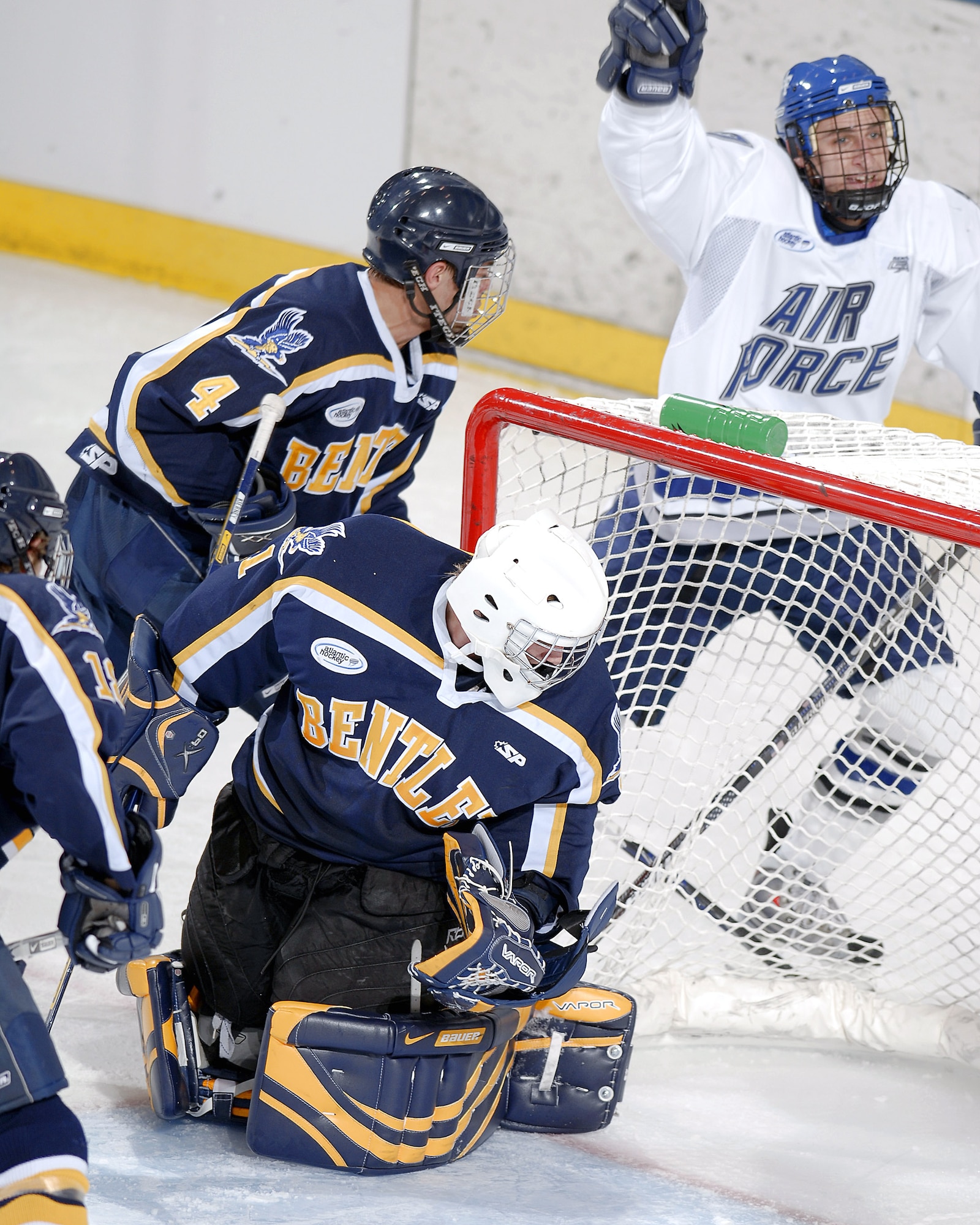 Air Force Academy forward Blake Page celebrates after scoring a goal as Air Force defeated Bentley College 5-1 in an Atlantic Hockey Association game Oct. 31 at the Academy's Cadet Ice Arena in Colorado Springs, Colo.  The next evening, the Academy skaters defeated Bentley 8-2, giving them a perfect 8-0 start, which ties a school record set in 1971-72. Air Force currently is ranked 14th in the nation.  (U.S. Air Force photo/Mike Kaplan)