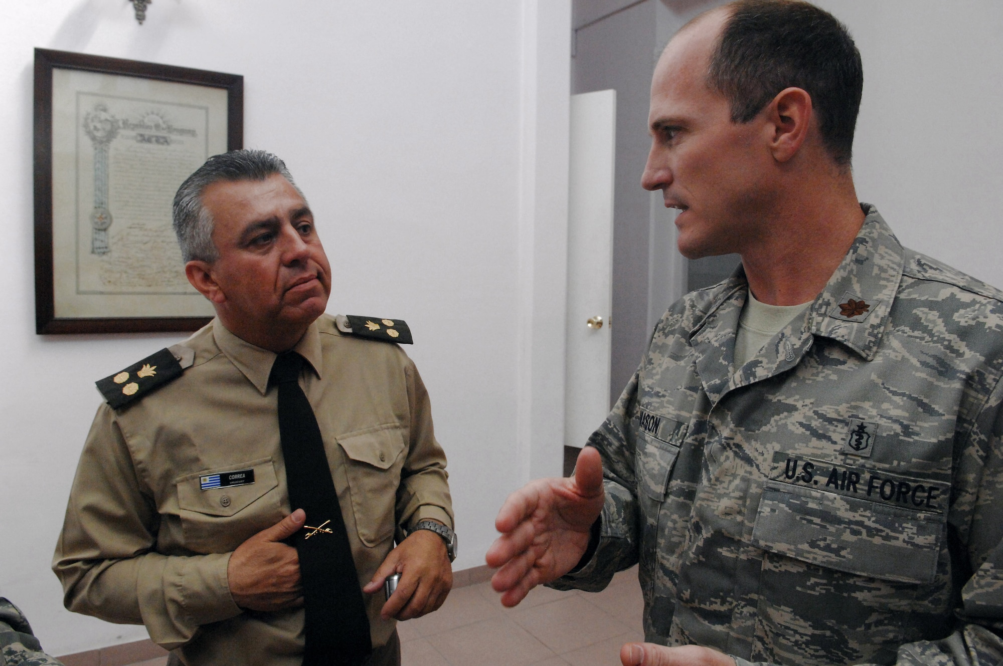 Maj. Phillip Mason talks with a Uruguayan army doctor Nov. 3 in Uruguay. Major Mason is from Wright-Patterson Air Force Base, Ohio. (U.S. Air Force photo/Tech. Sgt. Roy Santana)
