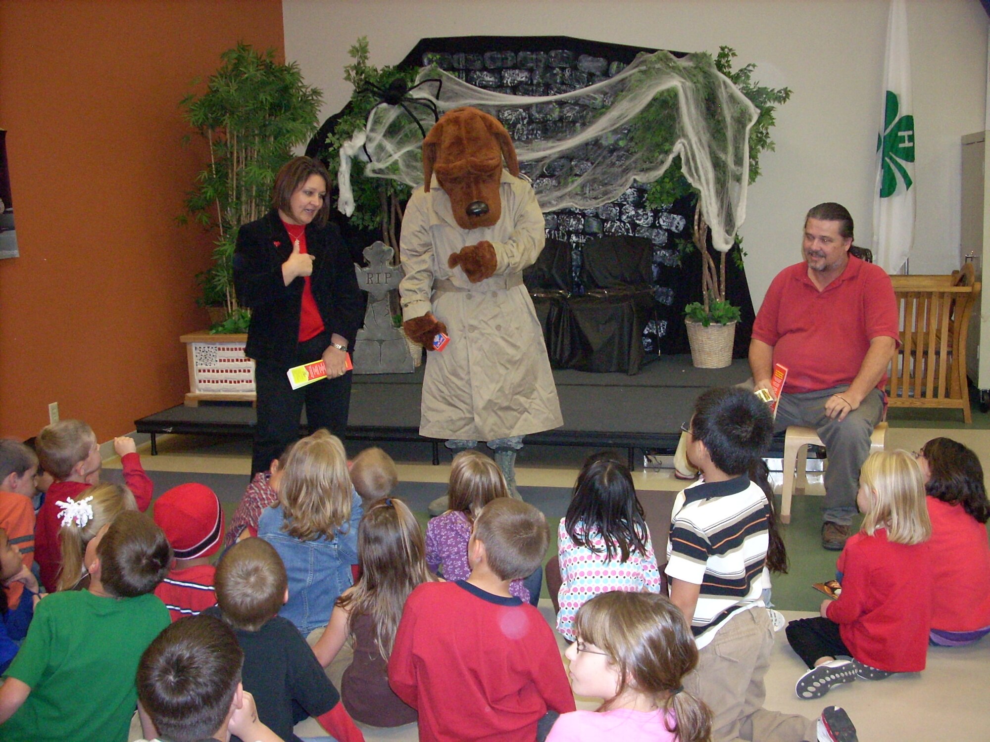 MCCONNELL AIR FORCE BASE, Kan. -- McGruff the Crime Dog visits McConnell’s School Age Program speaking to children about drug prevention and reasons why not to use drugs, Oct. 27.  This was one of many visits Team McConnell members participated in while educating children on drug prevention. (Courtesy photo)