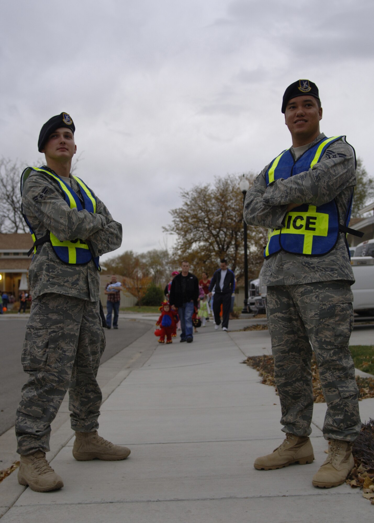 MOUNTAIN HOME AIR FORCE BASE, Idaho -- Staff Sgt. Christopher Reeves and Airman 1st Class Darryl Worthey, 366th Security Forces Squadron, conduct pumpkin patrol in the neightborhoods to ensure the safety of children and their families in base housing Oct. 31. (U.S. Air Force photo/Airman 1st Class Renishia Richardson)