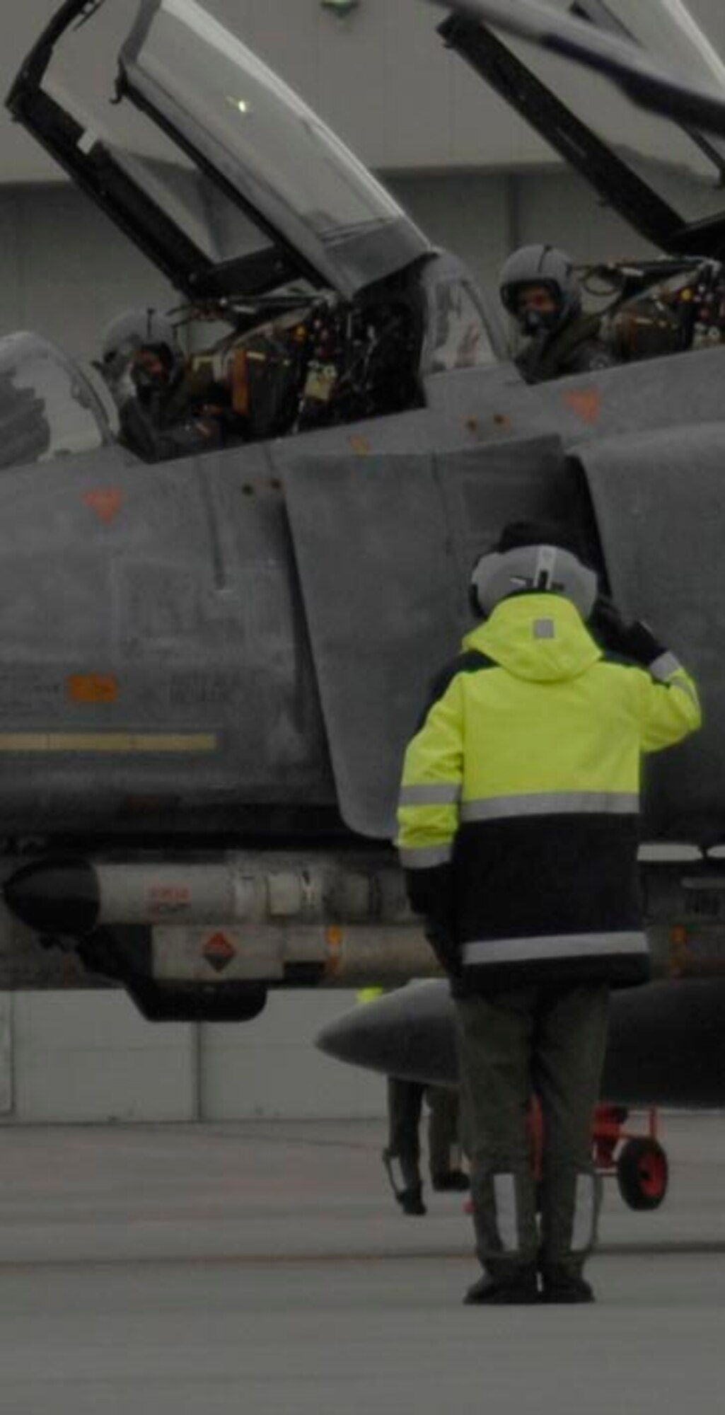 MOUNTAIN HOME AIR FORCE BASE, Idaho -- A German air force crew chief renders a salute as an F-4F II Phantom prepares to taxi for a training mission Oct. 16. The GAF was conducting simulated combat missions with the 389th and 391st fighter squadrons F-15E Strike Eagles until Oct. 31. (U.S. Air Force photo/Airman 1st Class Renishia Richardson)