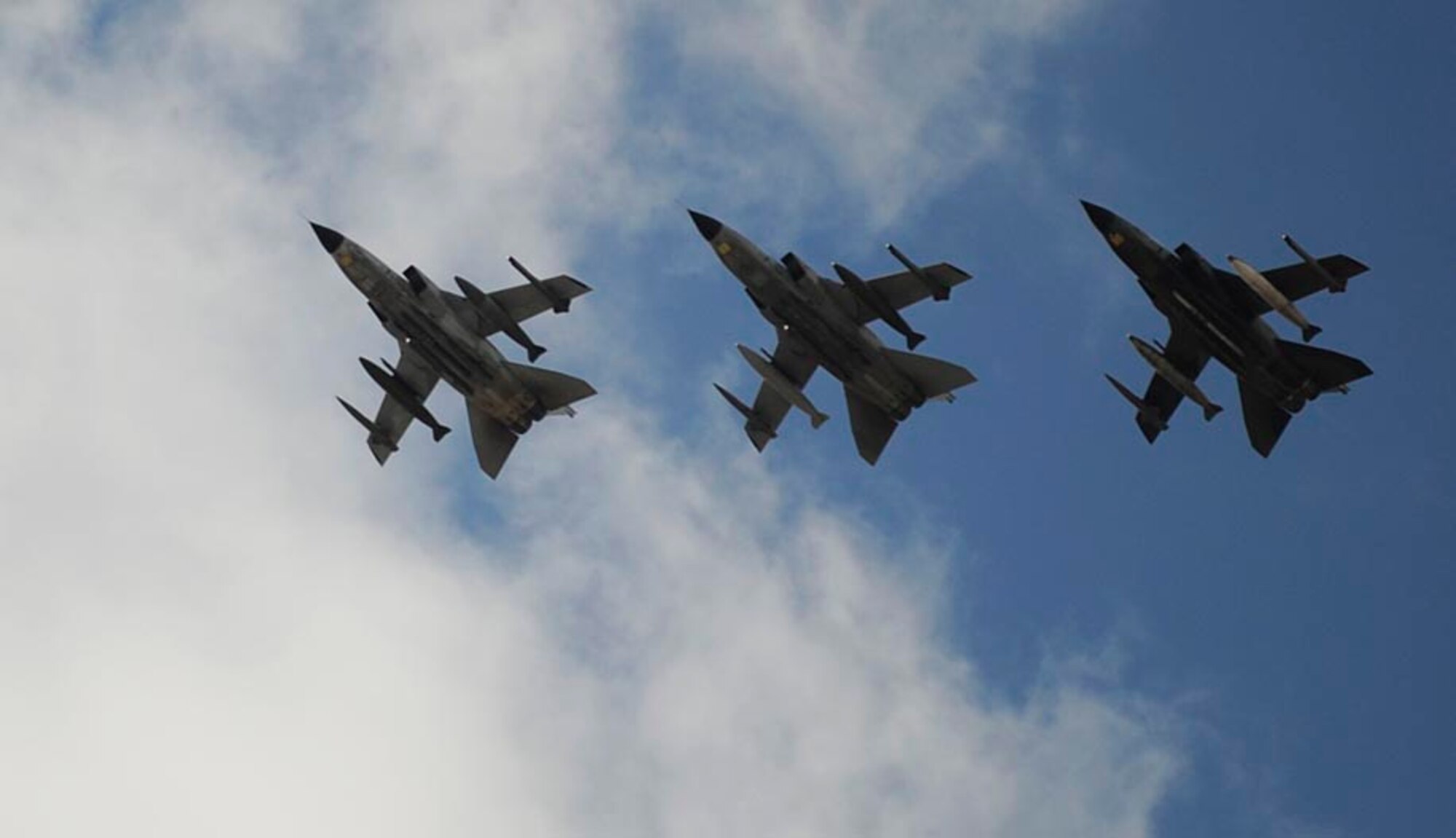 MOUNTAIN HOME AIR FORCE BASE, Idaho -- Three of eight German air force Tornado indicator/strike aircraft fly over the flight line before landing here Oct. 14. The GAF was training with Mountain Home AFB F-15E Strike Eagles in simulated combat missions for two weeks before heading back to Holloman AFB, N.M., their home base. (U.S. Air Force photo/ Airman 1st Class Ryan Crane)