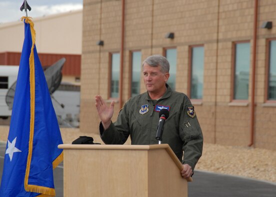 Maj. Gen. David Eichhorn, Air Force Flight Test Center commander, speaks to Team Edwards about the base's new main runway during a ribbon-cutting ceremony Oct.31. General Eichhorn as well as Col. Jerry Gandy, 95th Air Base Wing commander and Col. William Thornton 412th Test Wing commander, performed the first flight off the $118 million runway. (Air Force photo by Airman 1st Class William O'Brien)