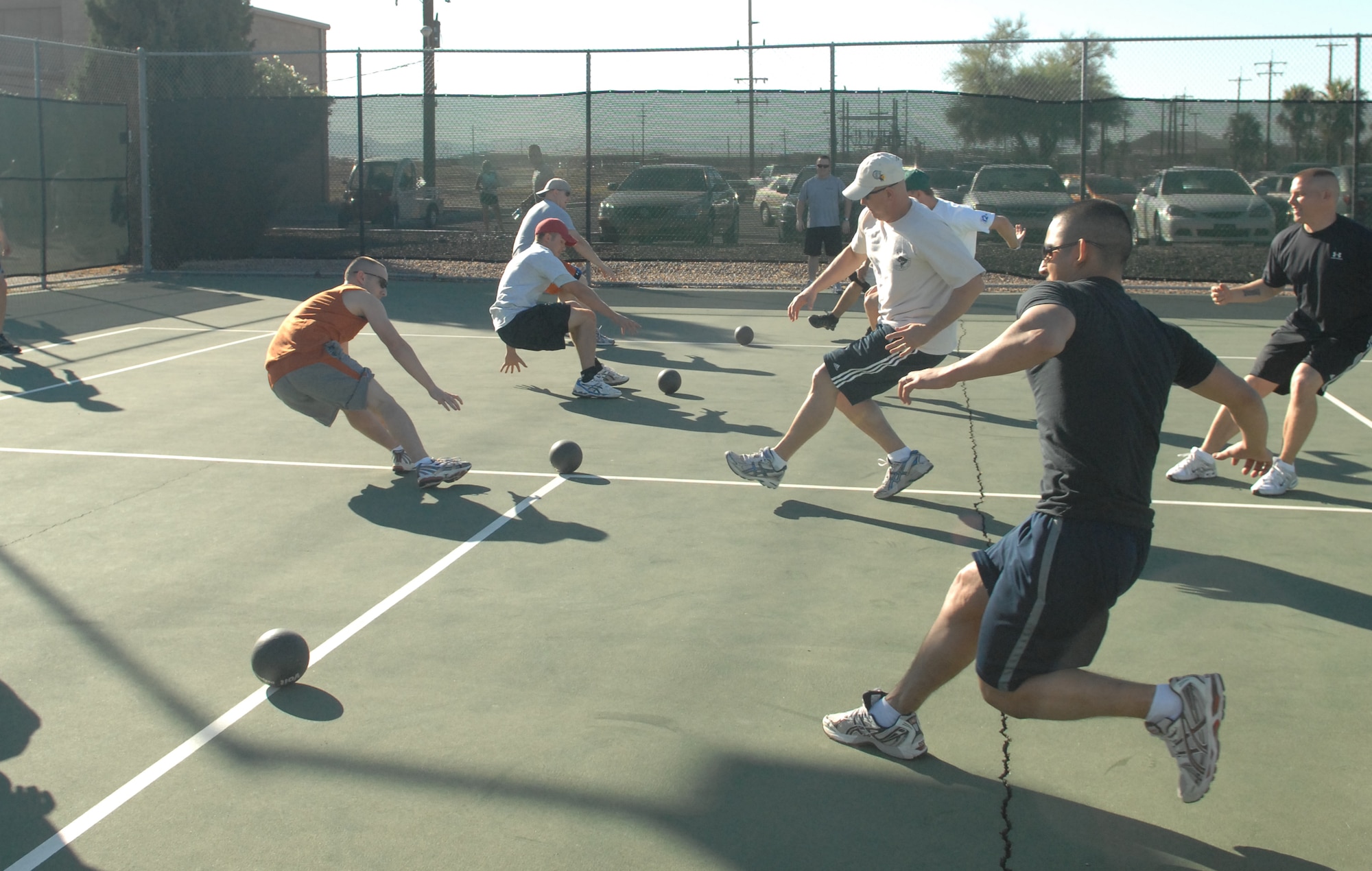 Airmen from Twelfth Air Force and Air Forces Southern compete in a game of dodgeball during their third bi-annual sports day at the tennis courts here Nov. 3. (U.S. Air Force photo/Airman 1st Class Jamie L. Coggan)