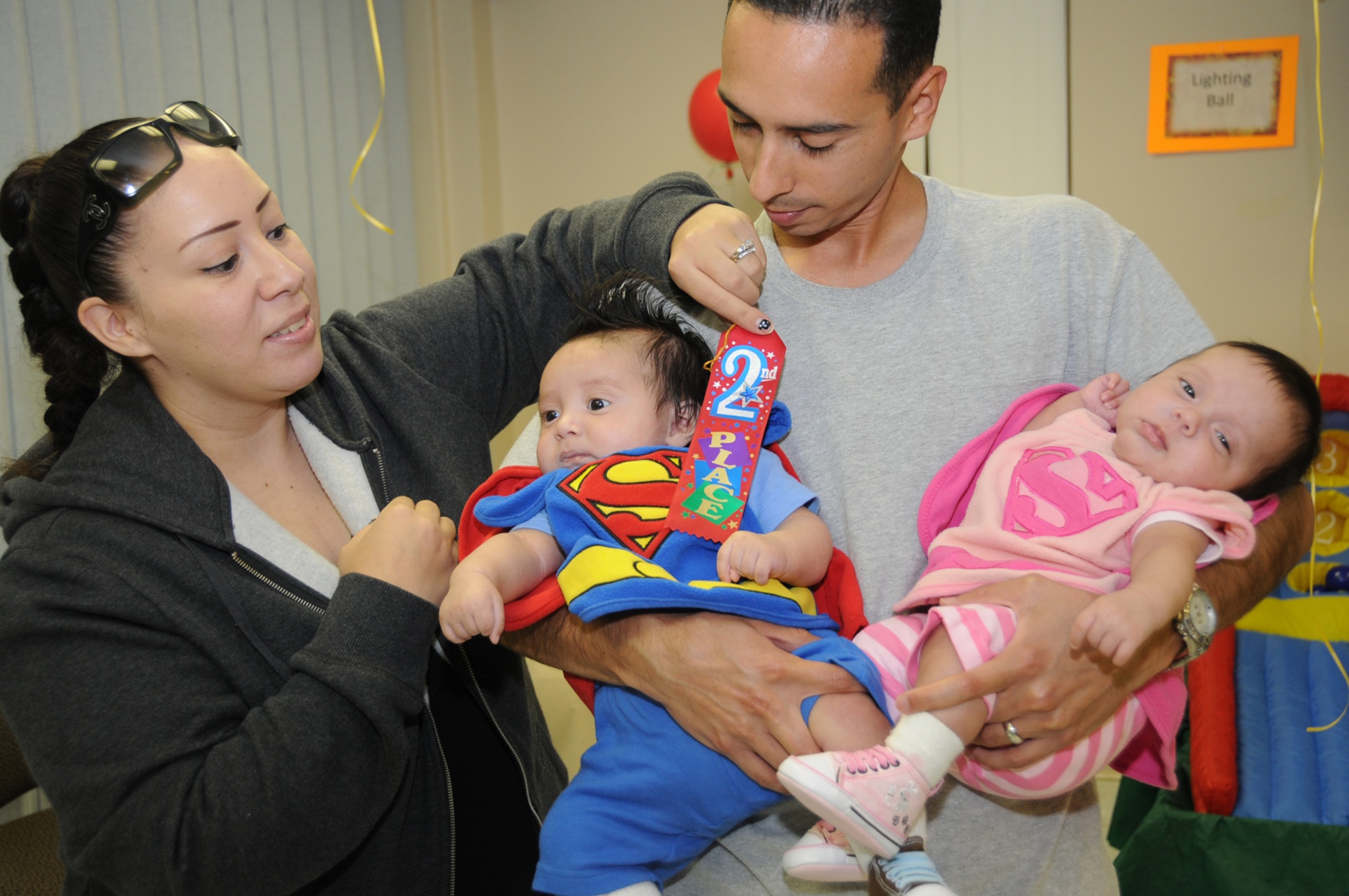 Three-month old twins, Ethan and Adriana Contreras, took second place in the harvest festival costume contest.  Their parents are Tech. Sgt. Steven and Carmen Contreras, 81st Medical Support Squadron.  (U.S. Air Force photo by Kemberly Groue)