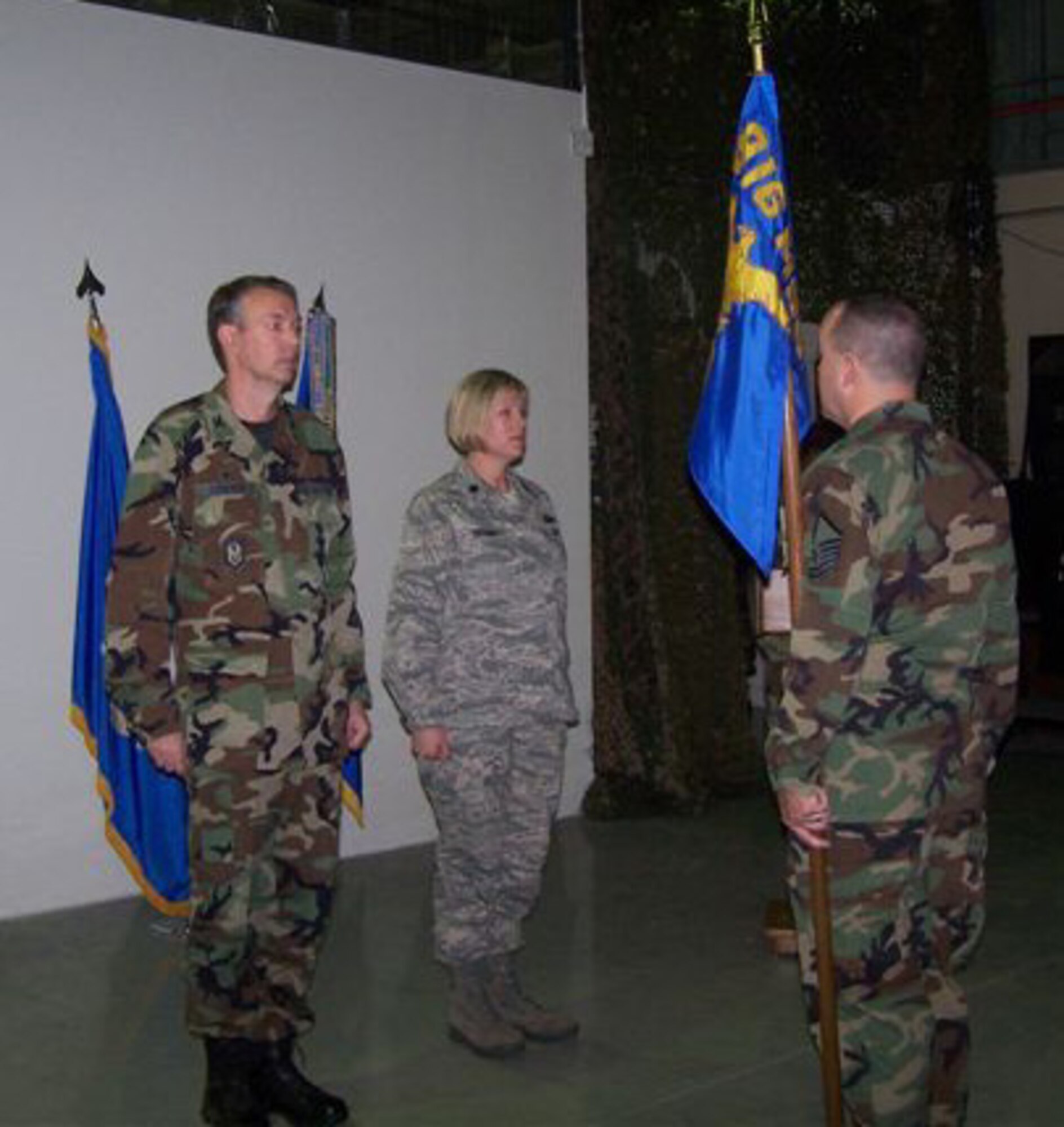 SEYMOUR JOHNSON AIR FORCE BASE, N.C. -- Lt. Col. Ann Brown (center) assumes command of the 916th Logistics Readiness Squadron during the October unit training assembly. Presiding over the ceremony is Col. Woody Woodson (left), commander of the 916th Mission Support Group. 