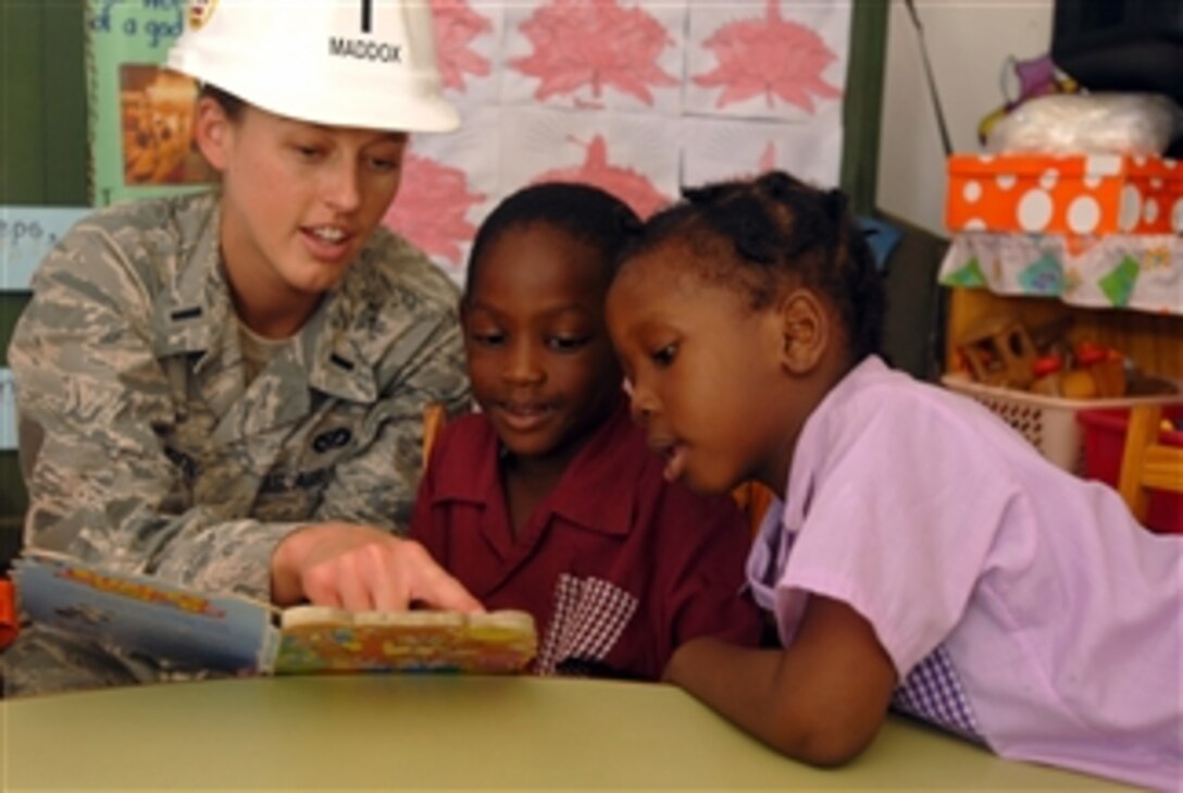 U.S. Air Force 1st Lt. Lindsey Maddox, embarked aboard the amphibious assault ship USS Kearsarge (LHD 3), reads to children at the All in One Child Development Center daycare in Port of Spain, Trinidad and Tobago, on Oct. 30, 2008.  The Kearsarge is deployed in support of the Caribbean phase of the humanitarian and civic assistance mission Continuing Promise 2008, an equal-partnership mission involving the United States, Canada, the Netherlands, Brazil, Nicaragua, Colombia, Dominican Republic, Trinidad and Tobago and Guyana.  