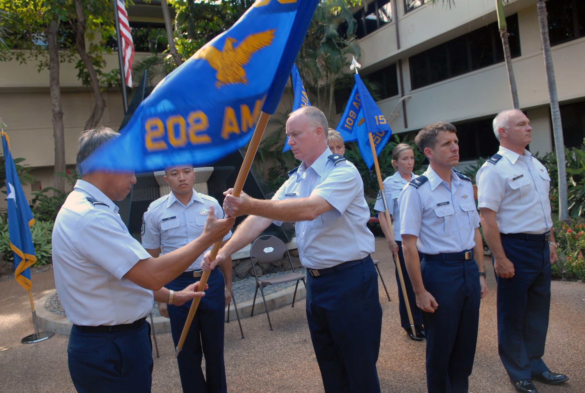Lt Colonel Robert J. Hoffman, III, the first Commander of Detachment 4, HQ Hawaii Air National Guard (202nd Air Mobility Operations Squadron) accepts the Squadron guidon from Maj. Gen. Darryll D.M. Wong, Commander of the Hawaii Air National Guard.  The 202nd AMOS is a part of the HIANG, 109th Air Operation Group activated on 2 November, 2008.  It is the only ANG AOC augmentation unit co-located with their active duty unit.