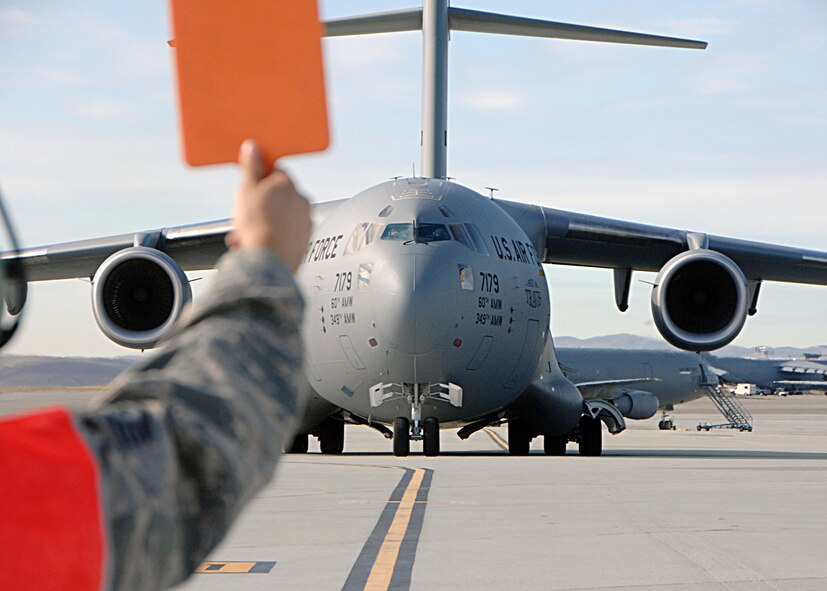 "The Spirit of Travis," Travis Air Force Base's final C-17 Globemaster III is taxied in to a waiting crowd on hand to witness it's arrival. The aircraft is the last of 13 C-17's scheduled to be delivered to Travis. (U.S. Air Force photo/Dave Cushman)