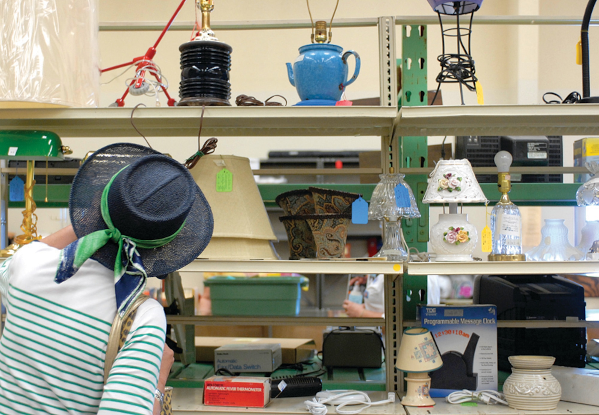 "There is always something good here, I never leave empty handed," said Jackie Oddo, thrift store shopper. Mrs. Oddo and her husband, Martin, shop at the Luke Thrift Store and they always find something to take home with them. (U.S. Air Force photo/ Deborah Silliman Wolfe.)