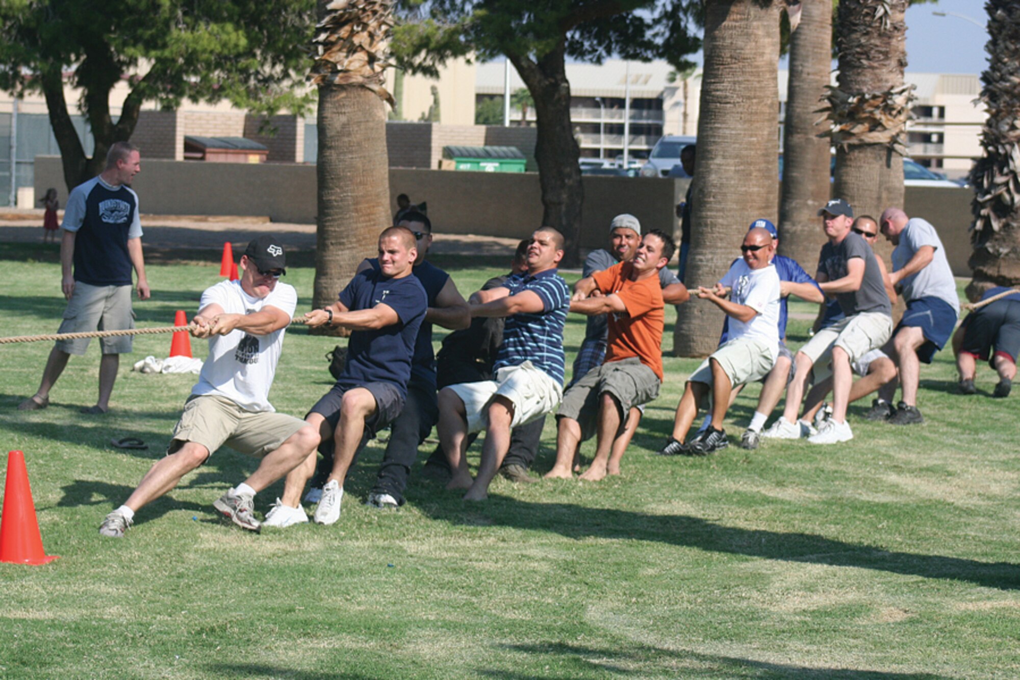 Members of the 309th Aircraft Maintenance Unit participate in tug-o-war during the "Duck Olympics" at Silver Wings Park Sept. 29. The event was for Airmen of the 309th to meet and greet one another. (Courtesy photo.)