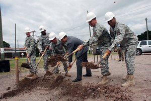 SOTO CANO AIR BASE, Honduras - Leadership from Joint Task Force-Bravo and Ambassador Hugo Llorens break ground Nov. 4 for construction of a new dining facility here. The old DFAC was constructed in 1987 and was meant to be temporary. It is scheduled to open March 2010. (U.S. Air Force photo by Staff Sgt. Joel Mease)