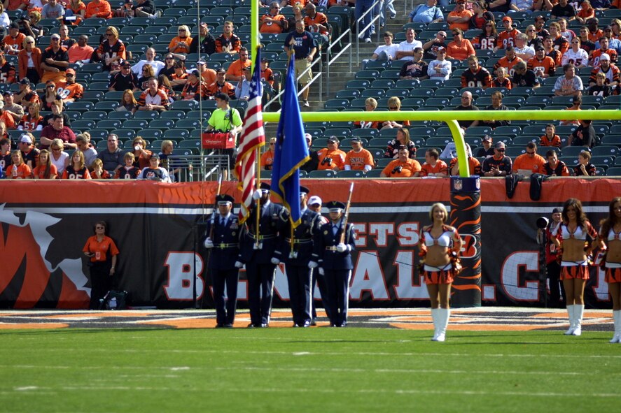 WRIGHT-PATTERSON AFB, Ohio - The 445th Airlift Wing had a strong presence at the Cincinnati Bengals' Paul Brown Stadium Nov. 2, 2008.  The 445th Honor Guard posted the colors and the wing performed an exciting C-5 Galaxy flyover before the Bengals football game Nov. 2, 2008. Members of the Honor Guard, from left to right, are Master Sgt. Aaron Wallenburg, 89th Airlift Squadron; Master Sgt. Michael Bailey, 87th Aerial Port Squadron, Master Sgt. Ed Engle, 445th Operations Support Squadron; and Senior Airman Carol Walker, 88th Air Base Wing.  (Courtesy photo/Cincinnati Bengals)