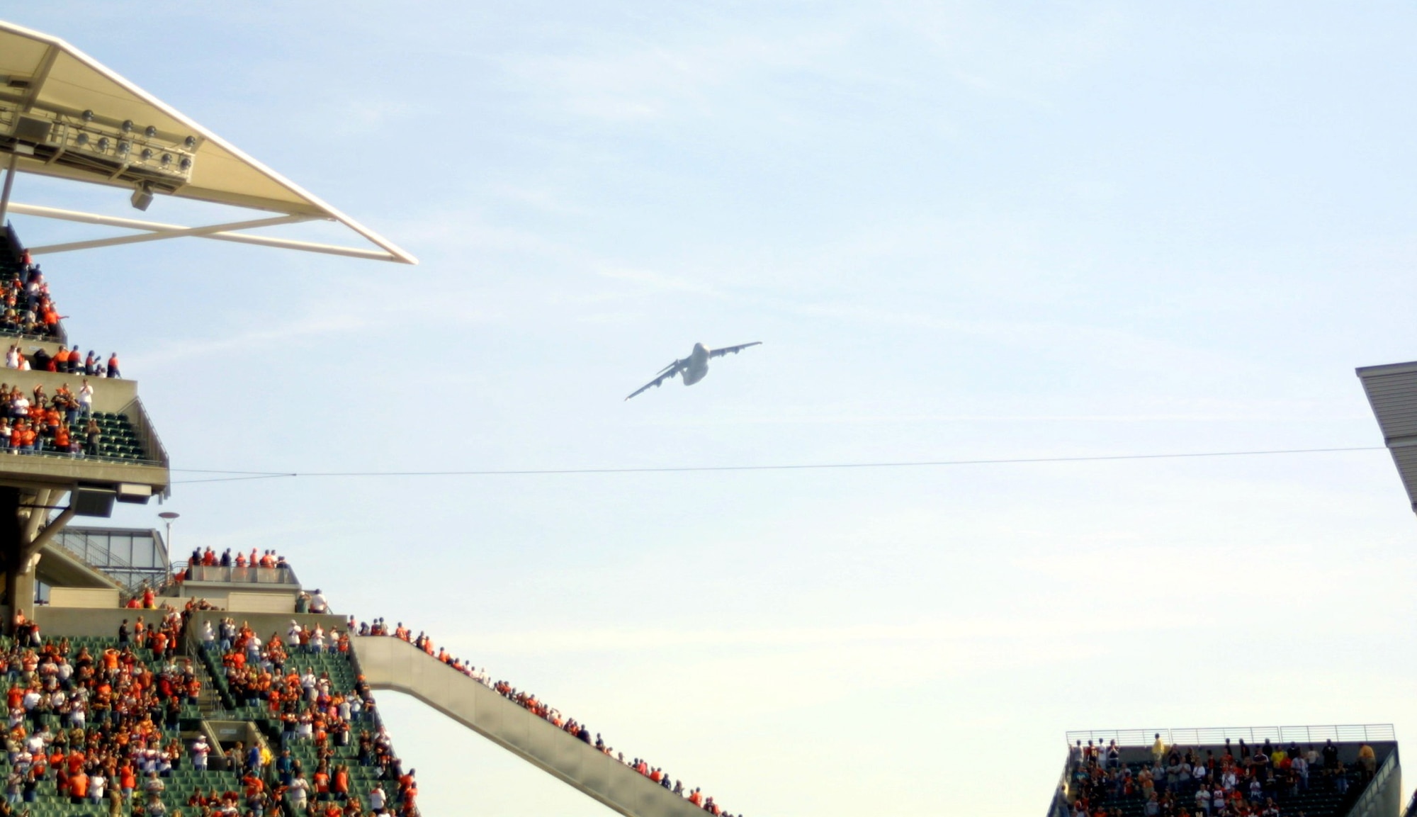 WRIGHT-PATTERSON AFB, Ohio - The 445th Airlift Wing performed an exciting C-5 Galaxy flyover before the Cincinnati Bengals football game Nov. 2, 2008.  The C-5 had perfect timing flying over Paul Brown Stadium just as the National Anthem finished playing. (Courtesy photo/Cincinnati Bengals)