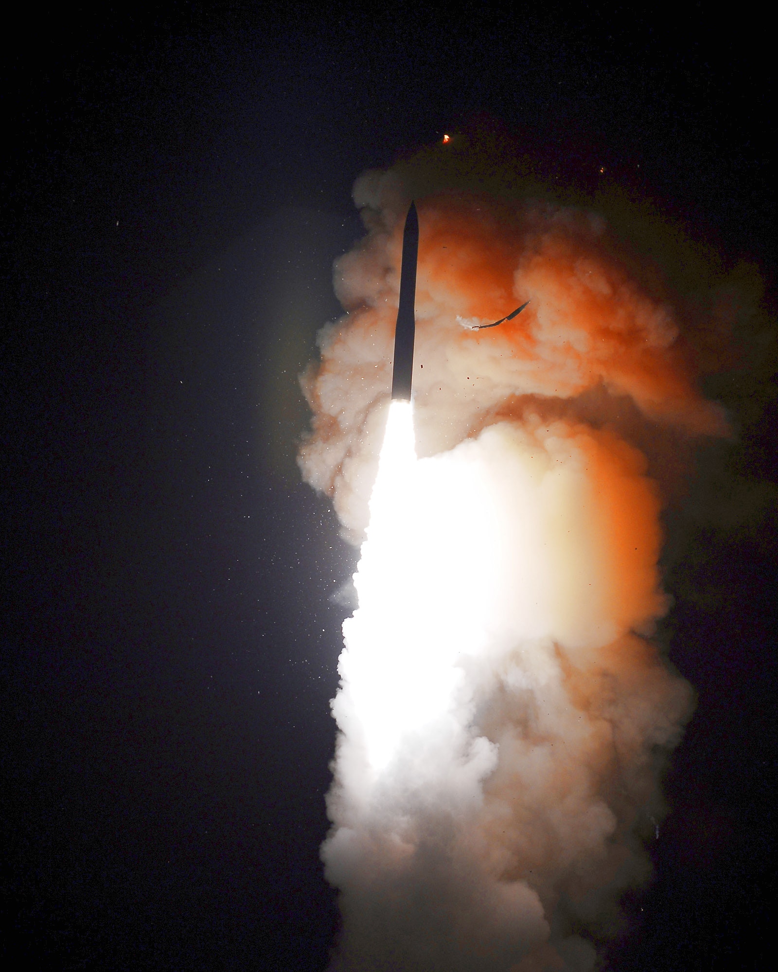 A Minuteman III intercontinental ballistic missile successfully launches at 1 a.m. Nov. 5 from Vandenberg Air Force Base, Calif. The missile was configured with a National Nuclear Security Administration test assembly in which a single unarmed re-entry vehicle traveled approximately 4,190 miles to their pre-determined targets near the Kwajalein Atoll in the Marshall Islands. (U.S. Air Force photo/Joe Davila) 
