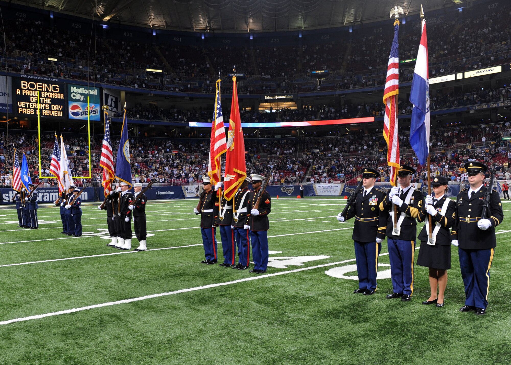 SCOTT AIR FORCE BASE, Ill. -- Honor Guards from each of the five Armed Services from units all over the St. Louis area were represented at the St. Louis Rams’ game Sunday, including the Scott Honor Guard. As part of the pregame Veteran’s Day festivities, each guard took part in a pass and review by U.S. Transportation Command commander Gen. Duncan J. McNabb. (U.S. Air Force photo/Airman 1st Class Wesley Farnsworth) 