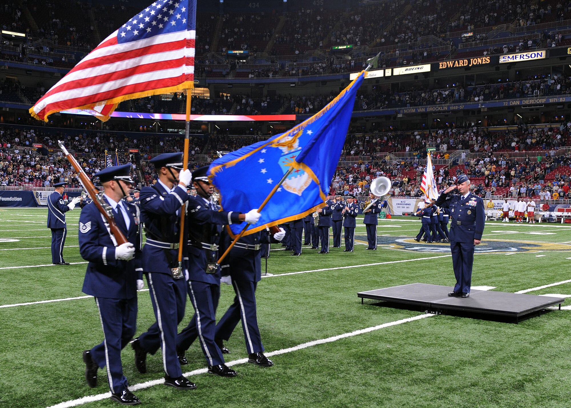 SCOTT AIR FORCE BASE, Ill. -- Members of U.S. Transportation Command, USAF Band of Mid-America and the Scott AFB Honor Guard were represented on the field before the St. Louis Rams’ game Sunday. Honor Guards from all five branches of the Armed Services conducted a pass and review for U.S. TRANSCOM commander Gen. Duncan J. McNabb. (U.S. Air Force photo/Airman 1st Class Wesley Farnsworth) 