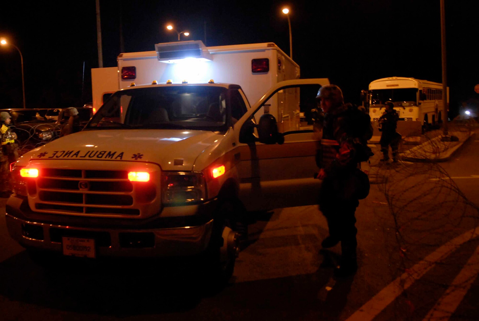 OSAN AIR BASE, Republic of Korea -- An ambulance arrives on scene to transport “injured” Airmen following a simulated missile attack during Exercise Beverly Bulldog 08-04. The exercise tests Team Osan’s ability to transition from peacetime to wartime operations, execution of the mission in a war time environment, and response time to major accident and natural disasters. (U.S. Air Force photo/Staff Sgt. Scottie McCord)