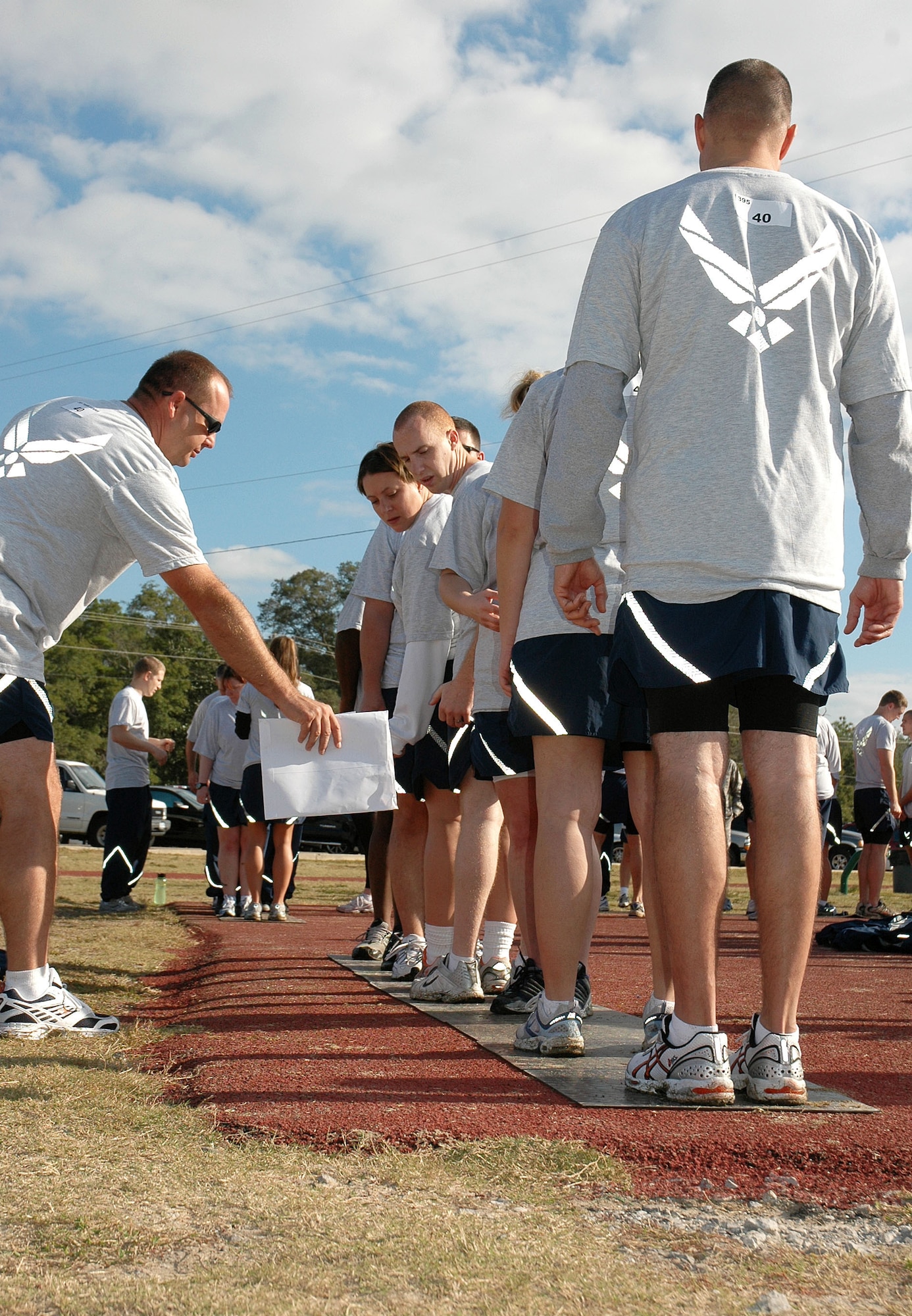 EGLIN AIR FORCE BASE, Fla. -- Team 40 Airmen from the 33rd Maintenance Squadron participating in the Wingman Day activities at Foster Stadium  Nov. 6 perform in the Traffic Jam challenge. Wingman Day is a day of teambuilding exercises and other events aimed at fostering the Wingman concept of looking out for fellow Airmen. (U.S. Air Force photo/Staff Sgt. Stacia Zachary)