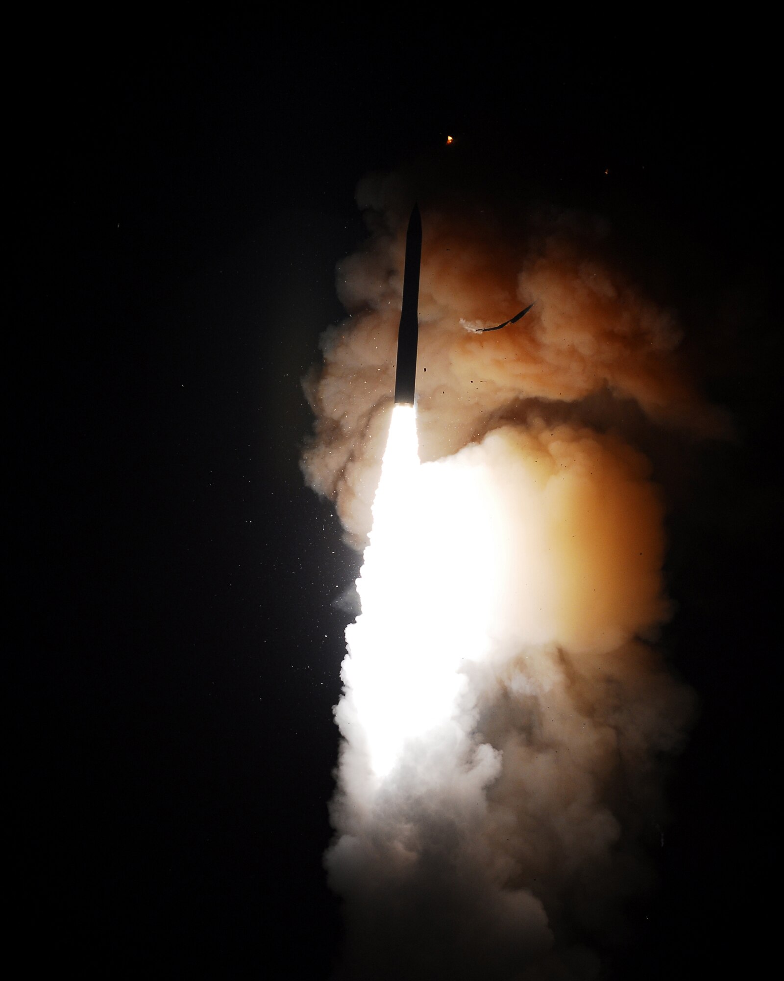 VANDENBERG AIR FORCE BASE, Calif. -- A Minuteman III intercontinental ballistic missile successfully launches at 1 a.m. Nov. 5 from North Vandenberg. The missile was configured with a National Nuclear Security Administration test assembly in which a single unarmed re-entry vehicle traveled approximately 4,190 miles to their pre-determined targets near the Kwajalein Atoll in the Marshall Islands. (U.S. Air Force photo /Joe Davila) 
